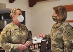 Maj. Gen. Tracy Norris, the adjutant general of Texas, left, talks with Lt. Gen. Laura Richardson, U.S. Army North commanding general, at the Texas State Operations Center in Austin, Texas, July 16, 2020. While there, military and civilian leaders strengthened their partnership and discussed the joint military COVID-19 operation in support of federal efforts and the state.