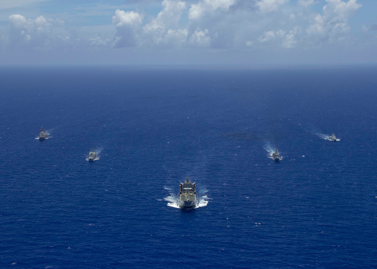 The U.S. Navy Arleigh Burke-class guided-missile destroyer USS Rafael Peralta (DDG 115), left, the Republic of Singapore Navy Formidable-class RSS Supreme (73), the Royal Australian Navy support ship HMAS Sirius (O 266), the Anzac-class frigate HMAS Stuart (FFH 153), and the Royal Brunei Navy Darussalam-class offshore patrol vessel KDB Darulehsan (OPV-07) sail in formation as they transit the Pacific Ocean. Rafael Peralta is underway conducting operations in support of security and stability in the Indo-Pacific while assigned to Destroyer Squadron (DESRON) 15, the Navy's largest forward-deployed DESRON and the U.S. 7th Fleet's principal surface force. (U.S. Navy photo by Mass Communication Specialist 2nd Class Jason Isaacs)