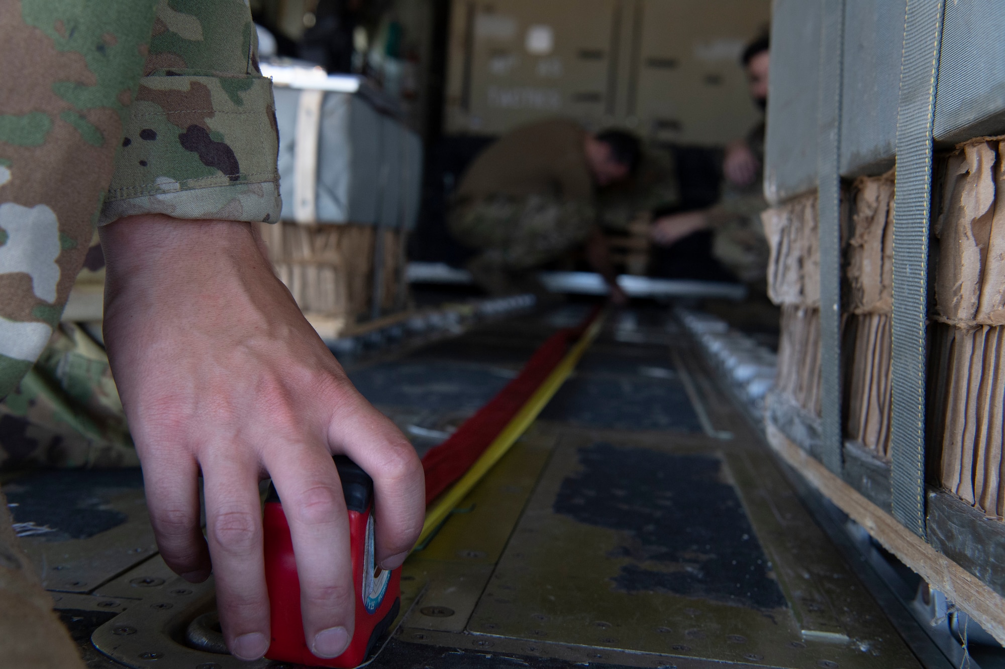 Airman 1st Class Cameron Bou, 41st Airlift Squadron loadmaster, prepares a C-130J Super Hercules for loading operations during pre-deployment training at Montrose Regional Airport, Colorado, July 27, 2020. This training is part of the 4/12 deployment initiative, which was developed in 2019 between airlift squadrons from Dyess Air Force Base, Texas and Little Rock AFB, allowing each squadron a full year of dwell time followed by a four-month rotation to their respective area of responsibility. (U.S. Air Force photo by Airman 1st Class Aaron Irvin)