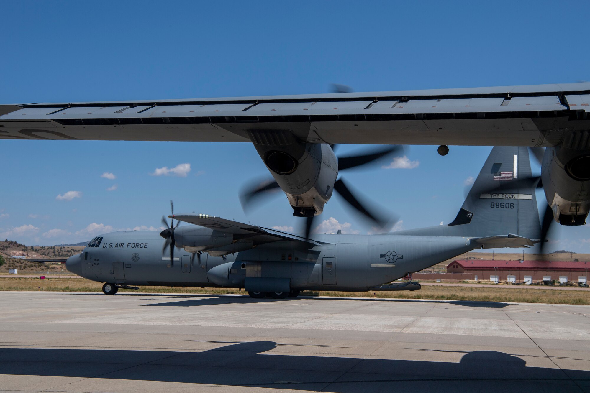 A C-130J Super Hercules assigned to the 41st Airlift Squadron taxis prior to takeoff during pre-deployment training at Montrose Regional Airport, Colorado, July 27, 2020. This training is part of the 4/12 deployment initiative, which was developed in 2019 between airlift squadrons from Dyess Air Force Base, Texas and Little Rock AFB, allowing each squadron a full year of dwell time followed by a four-month rotation to their respective area of responsibility. (U.S. Air Force photo by Airman 1st Class Aaron Irvin)
