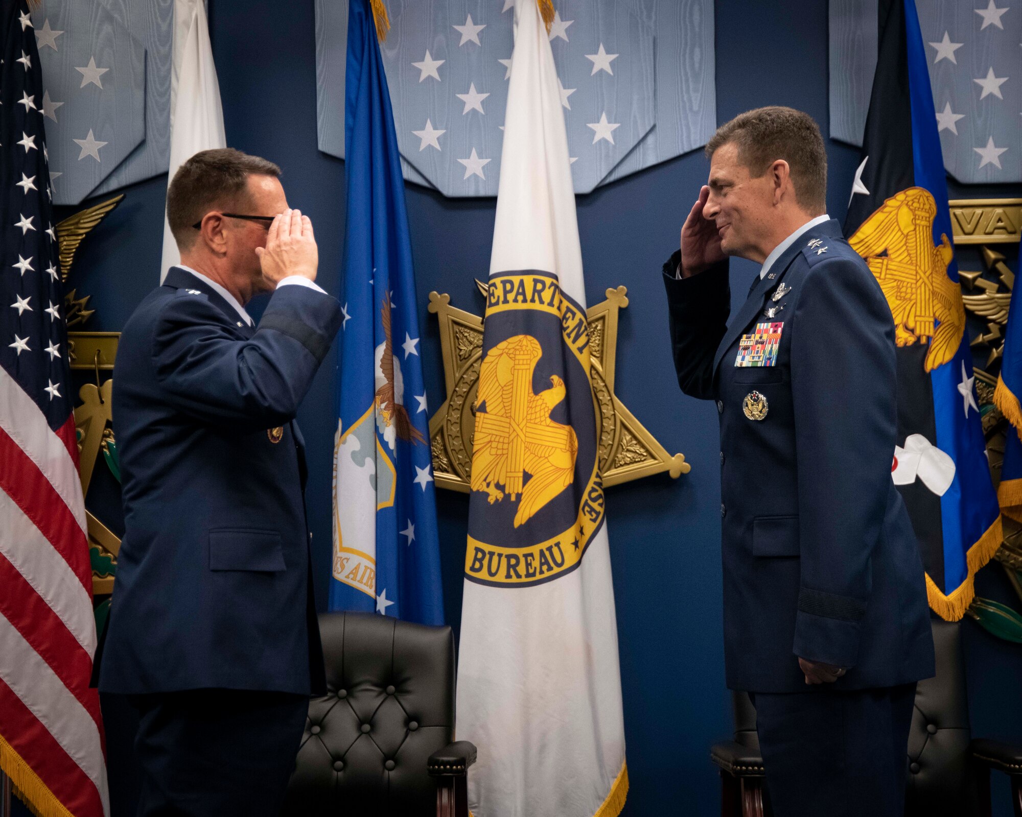 U.S. Air Force Lt. Gen. Michael A. Loh salutes Gen. Joseph L. Lengyel, the 28th Chief of the National Guard Bureau, during a Change of Responsibility ceremony at the Pentagon July 28, 2020. During the ceremony, Loh assumed responsibility as the 13th director of the Air National Guard and was promoted to the rank of lieutenant general. (U.S. Air National Guard photo by Technical Sgt. Morgan R. Lipinski)