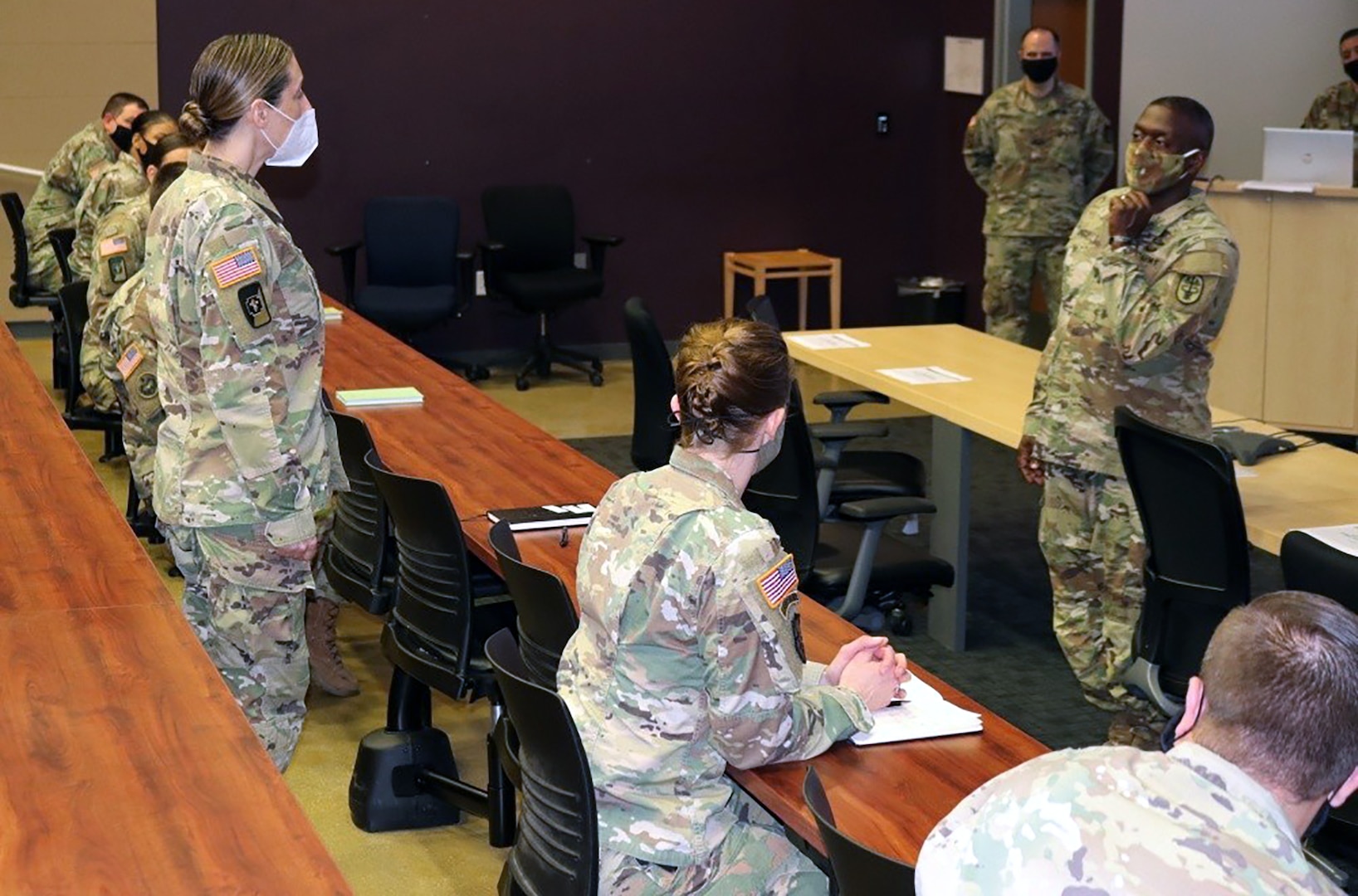 Lt. Gen. R. Scott Dingle, right, the 45th surgeon general of the Army, meets with Soldiers who are supporting COVID-19 relief efforts for Task Force Medical at the Mission Training Complex, Joint Base San Antonio-Fort Sam Houston, July 27, 2020.