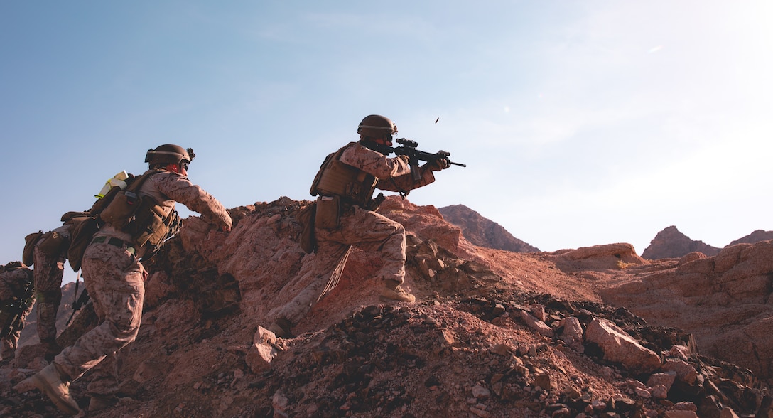 U.S. Marines conduct fire and maneuver during a fire team assault range in Jordan, July 31.