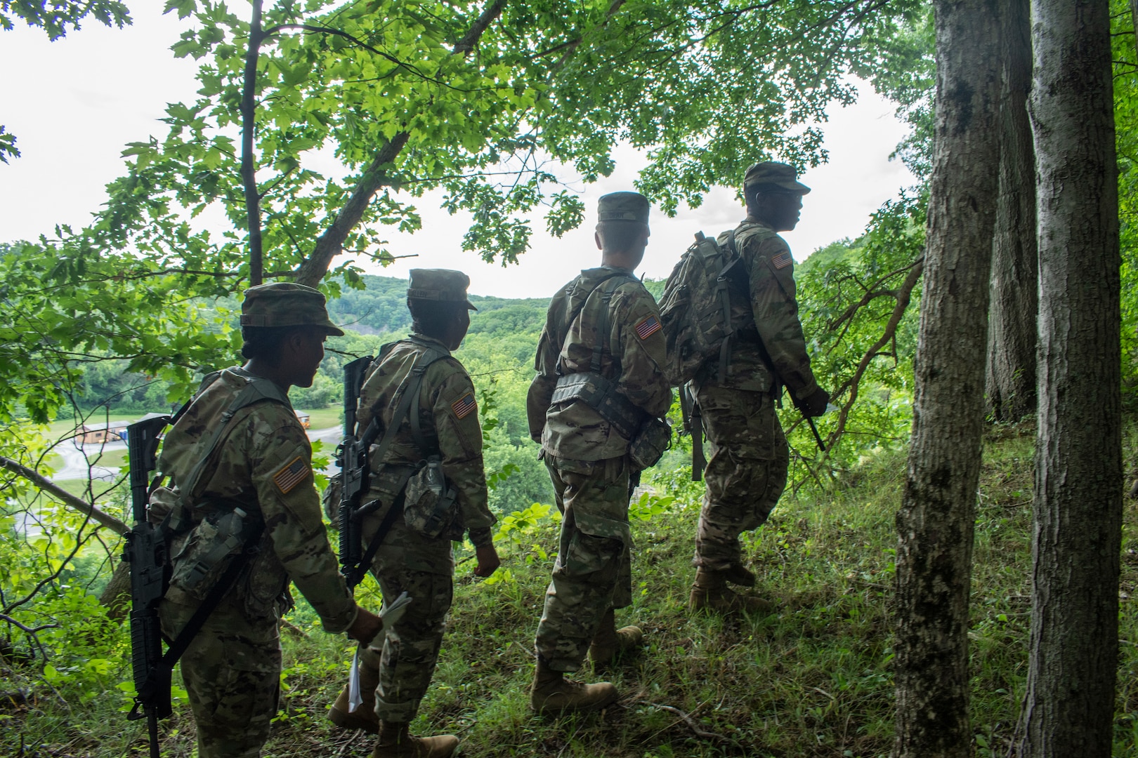 New York Army National Guard Soldiers assigned to 3rd Battalion, 142nd Aviation Regiment, find their way during land navigation training as part of their annual training at the Guilderland Range in Guilderland, New York, July 29, 2020.