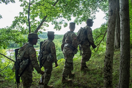 New York Army National Guard Soldiers assigned to 3rd Battalion, 142nd Aviation Regiment, find their way during land navigation training as part of their annual training at the Guilderland Range in Guilderland, New York, July 29, 2020.