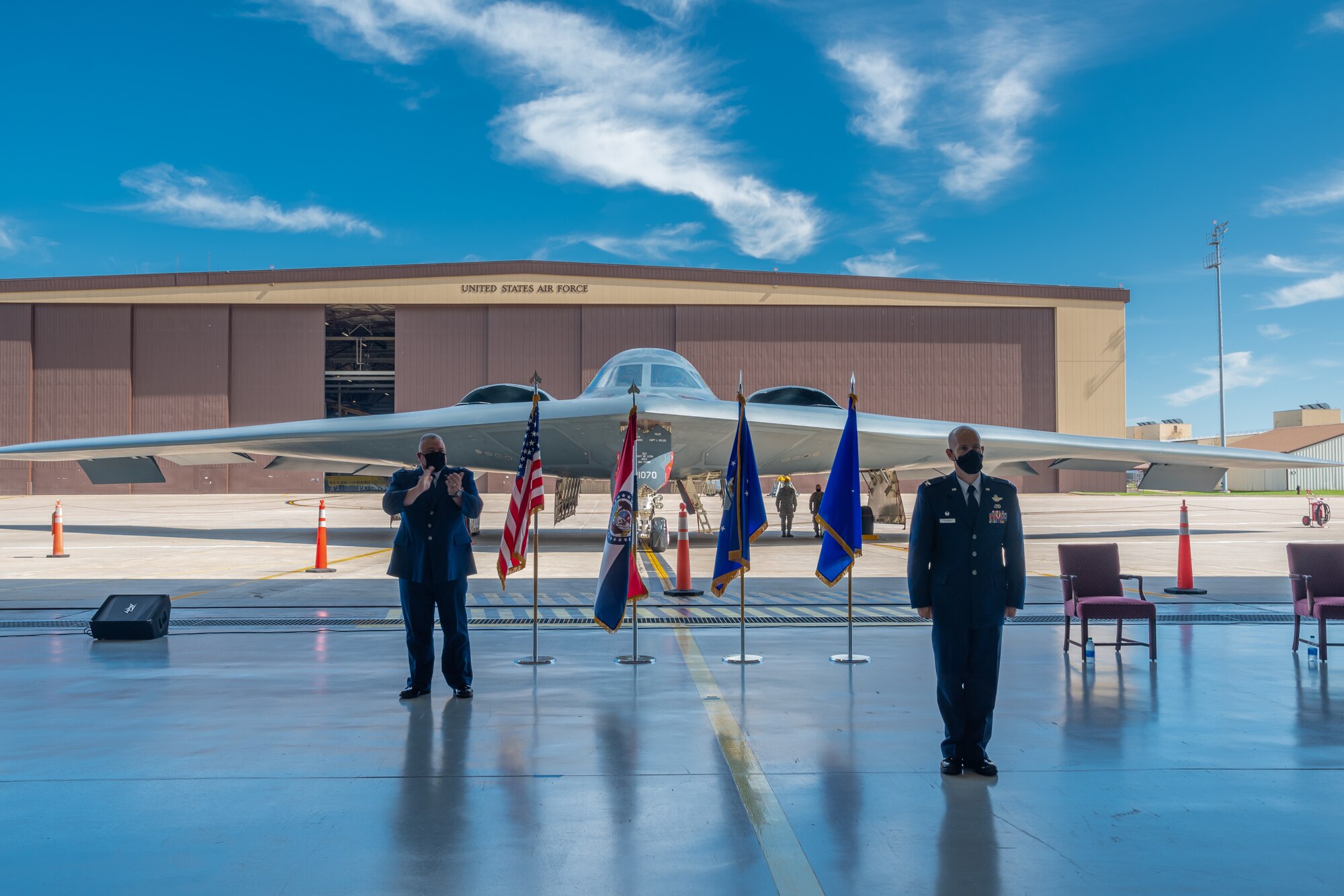 Friends, family, and state and local leaders gather to celebrate Col. Matthew D. Calhoun assuming command of the Missouri Air National Guard's 131st Bomb Wing during an Aug. 1, 2020, ceremony at Whiteman AFB, Mo. Calhoun previously served as the wing's vice commander, and has more than 16 years of experience in the B-2 Spirit stealth bomber community. (U.S. Air National Guard photo by Airman 1st Class Joseph Geldermann)