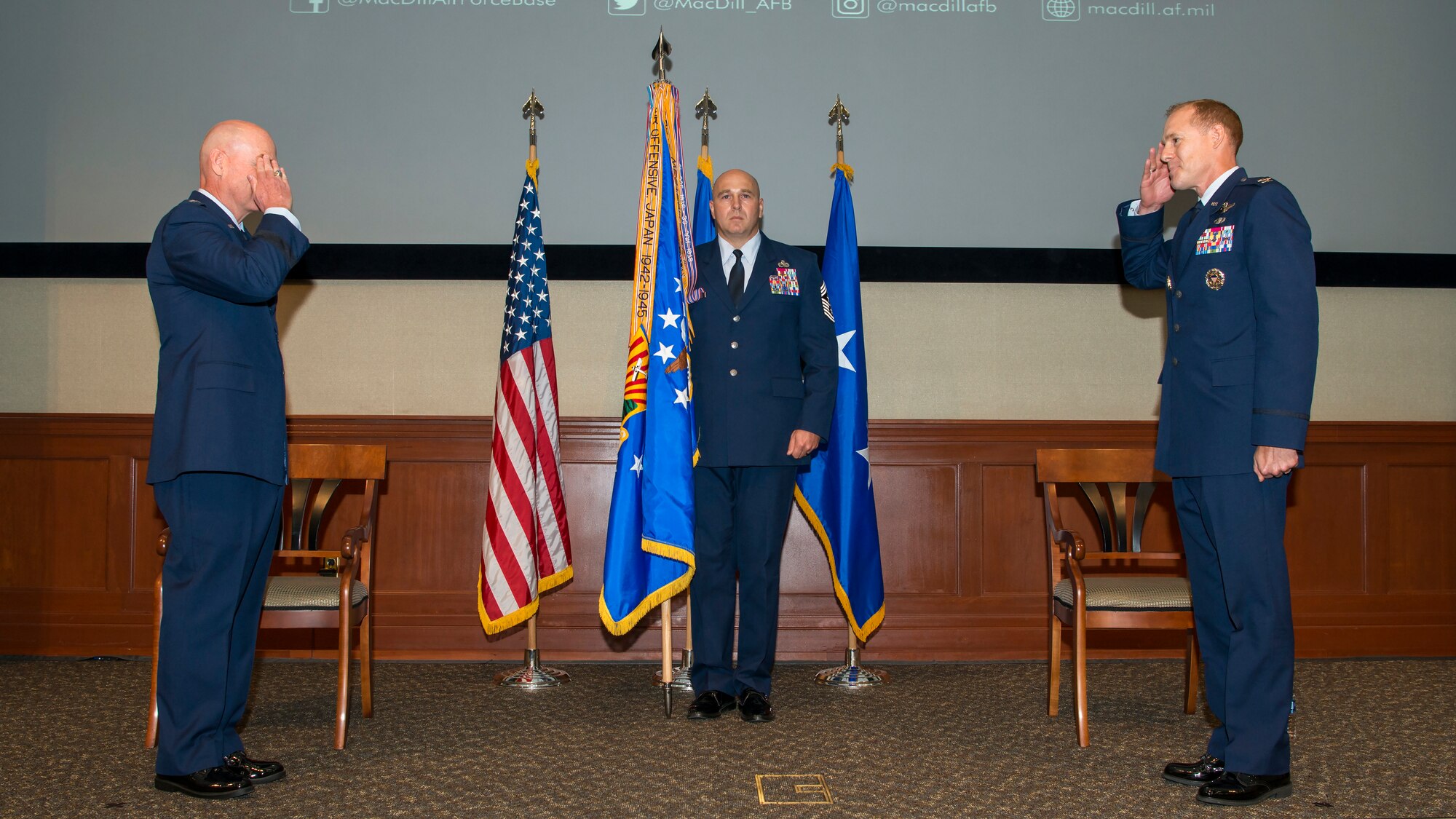 U.S. Air Force Maj. Gen. Sam Barrett, the 18th Air Force commander, salutes Col. Benjamin Jonsson, assuming 6th Air Refueling Wing (ARW) commander, during an assumption of command ceremony at MacDill Air Force Base, Fla., Aug. 4, 2020.