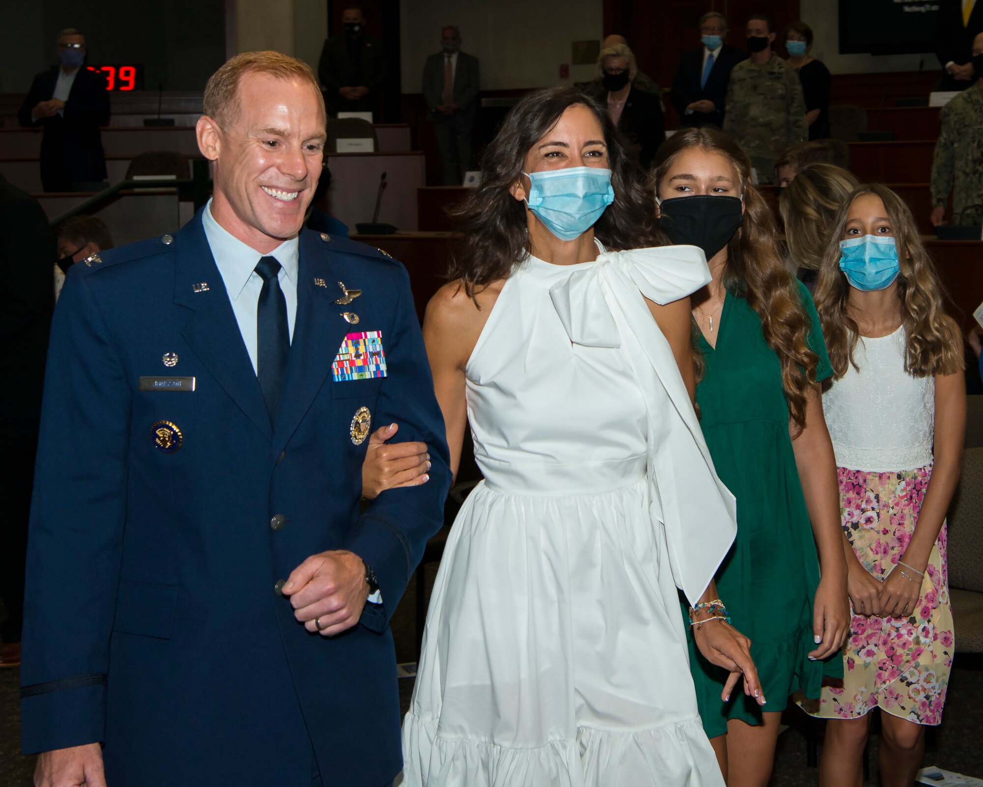 U.S. Air Force Col. Benjamin Jonsson, assuming 6th Air Refueling Wing (ARW) commander, walks with his wife Heather at the 6th ARW assumption of command ceremony at MacDill Air Force Base, Fla., Aug. 4, 2020.