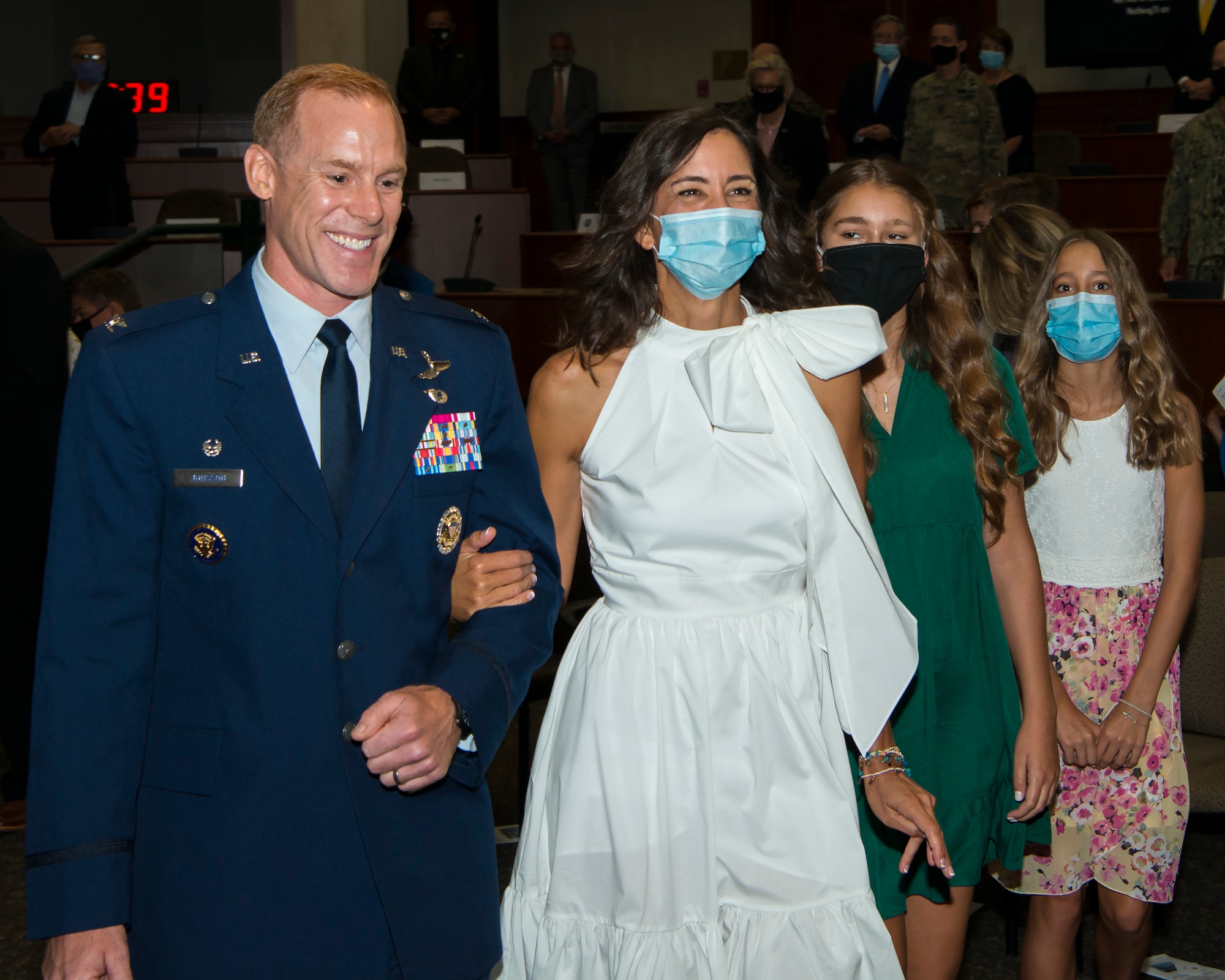 U.S. Air Force Col. Benjamin Jonsson, assuming 6th Air Refueling Wing (ARW) commander, walks with his wife Heather at the 6th ARW assumption of command ceremony at MacDill Air Force Base, Fla., Aug. 4, 2020.