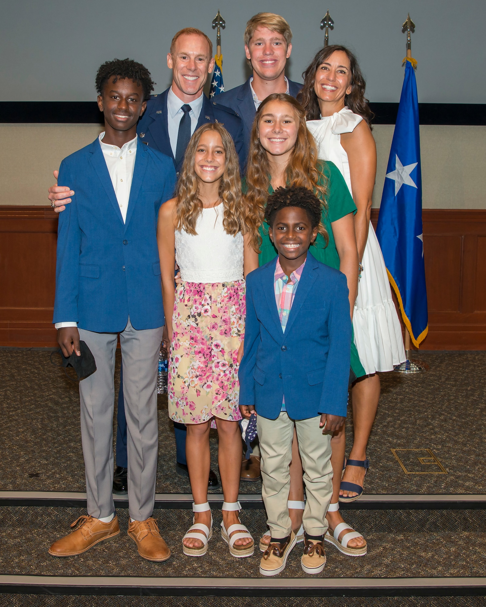 U.S. Air Force Col. Benjamin Jonsson, assuming 6th Air Refueling Wing (ARW) commander, gathers with his wife, Heather, and their children Jonas, Shae, Baruk, Raiya and Tagen, at the 6th ARW assumption of command ceremony at MacDill Air Force Base, Fla., Aug. 4, 2020.