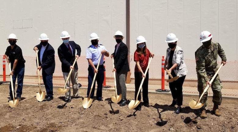 People break ground on a new project.