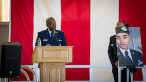 Chaplain, Capt. Jay Clark provides his remarks during a memorial service for three Security Forces members lost this year at Edwards Air Force Base, California, Aug. 3. (Air Force photo by Giancarlo Casem)