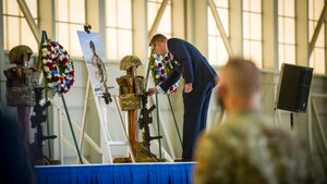 Lt. Col. Joseph A Bincarousky Sr., the 412th Security Forces Squadron Commander, presents a posthumous Air Force Achievement Medal to Airman 1st Class Corey Jones, at Edwards Air Force Base, California, Aug. 3. (Air Force photo by Giancarlo Casem)