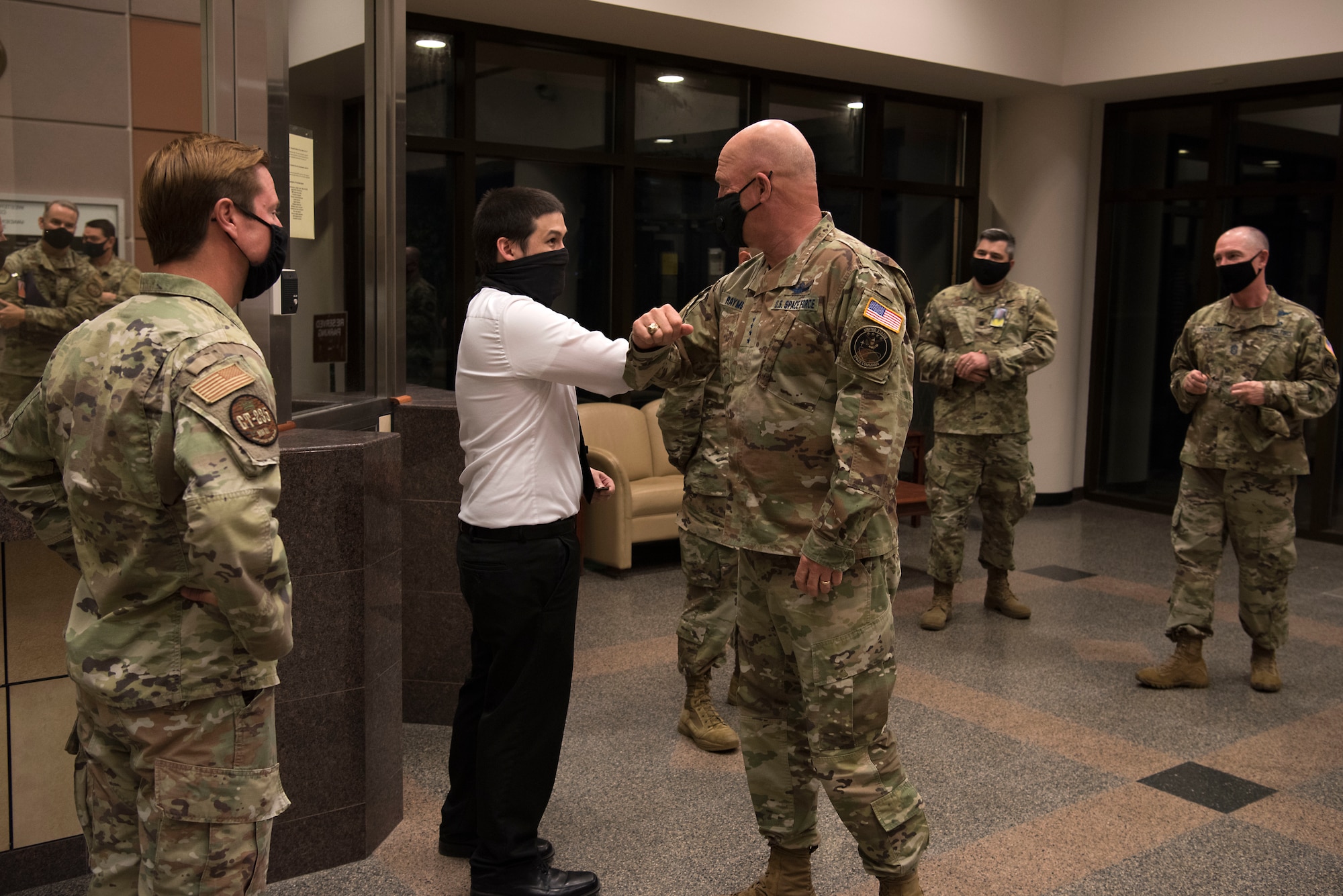 Gen. Jay Raymond, U.S. Space Force Chief of Space Operations and commander of U.S. Space Command, Chief Master Sgt. Roger A. Towberman, U.S. Space Force Senior Enlisted Advisor, are greeted by 30th Space Wing members at the 30th SW’s Western Range Operation Control Center Aug. 3, 2020 at Vandenberg Air Force Base, Calif.