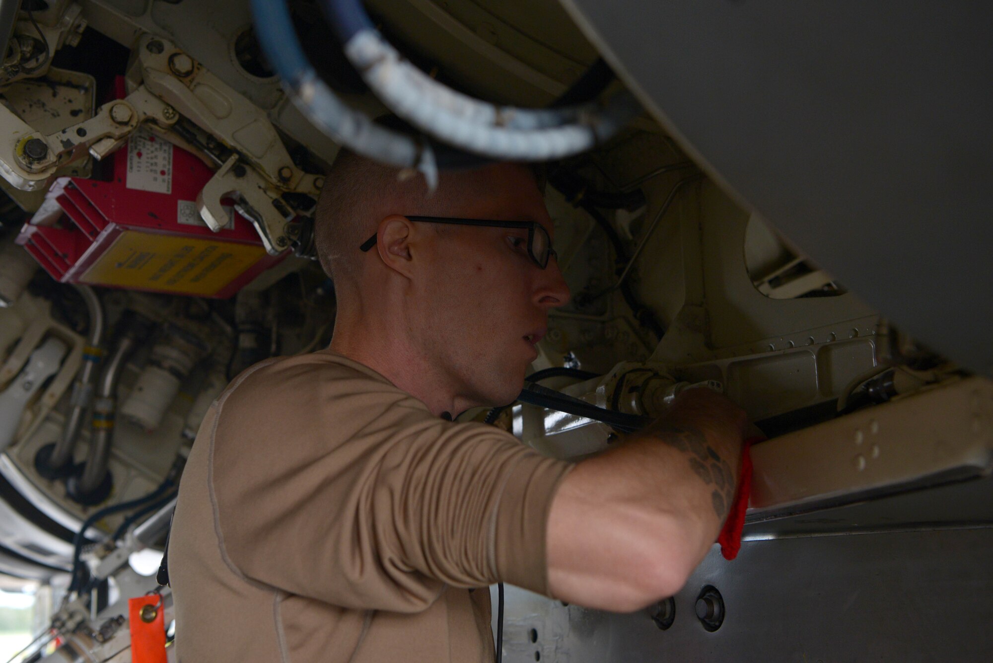 U.S. Air Force Senior Airman Joshua Zacharko, an 18th Aircraft Maintenance Unit (AMU) crew chief, cleans landing gear on an F-16 Fighting Falcon aircraft during RED FLAG-Alaska 20-3 on Eielson Air Force Base, Alaska, Aug. 4, 2020. It’s the responsibility of crew chiefs to ensure that every component of these high performance aircraft is maintained to the highest standards.(U.S. Air Force photo by Senior Airman Beaux Hebert)