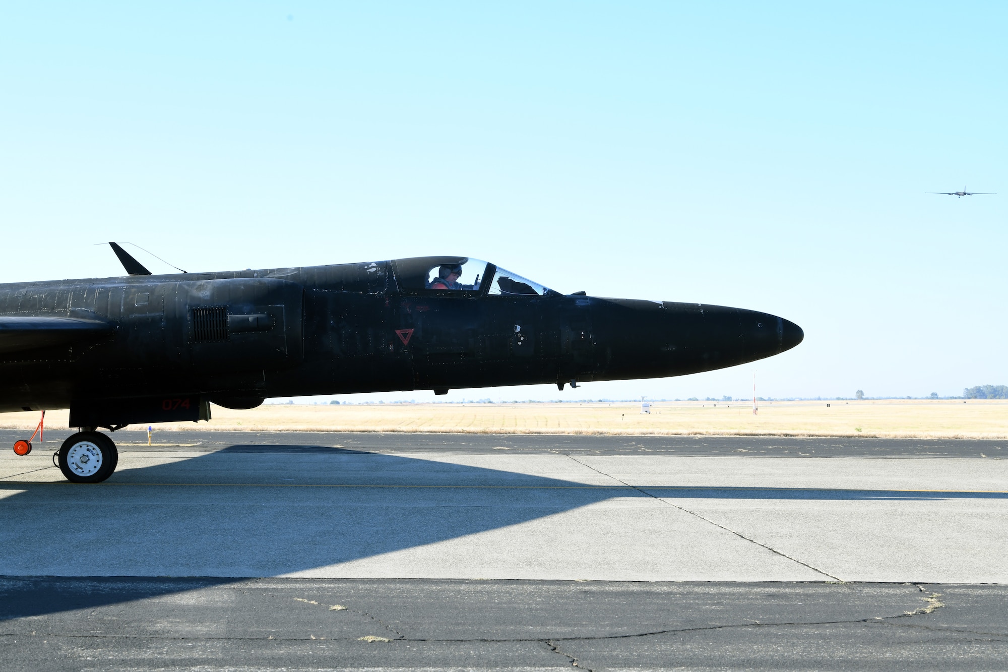 A U-2 piloted by retired Lt. Col Jonathan Huggins, 1st Reconnaissance Squadron U-2 instructor pilot, prepares for takeoff July 31, 2020 at Beale Air Force Base, California. U-2 pilots have limited forward visibility due to the extended aircraft nose combined with the slight upward tilt of the aircraft. (U.S. Air Force photo by Airman 1st Class Luis A. Ruiz-Vazquez.)