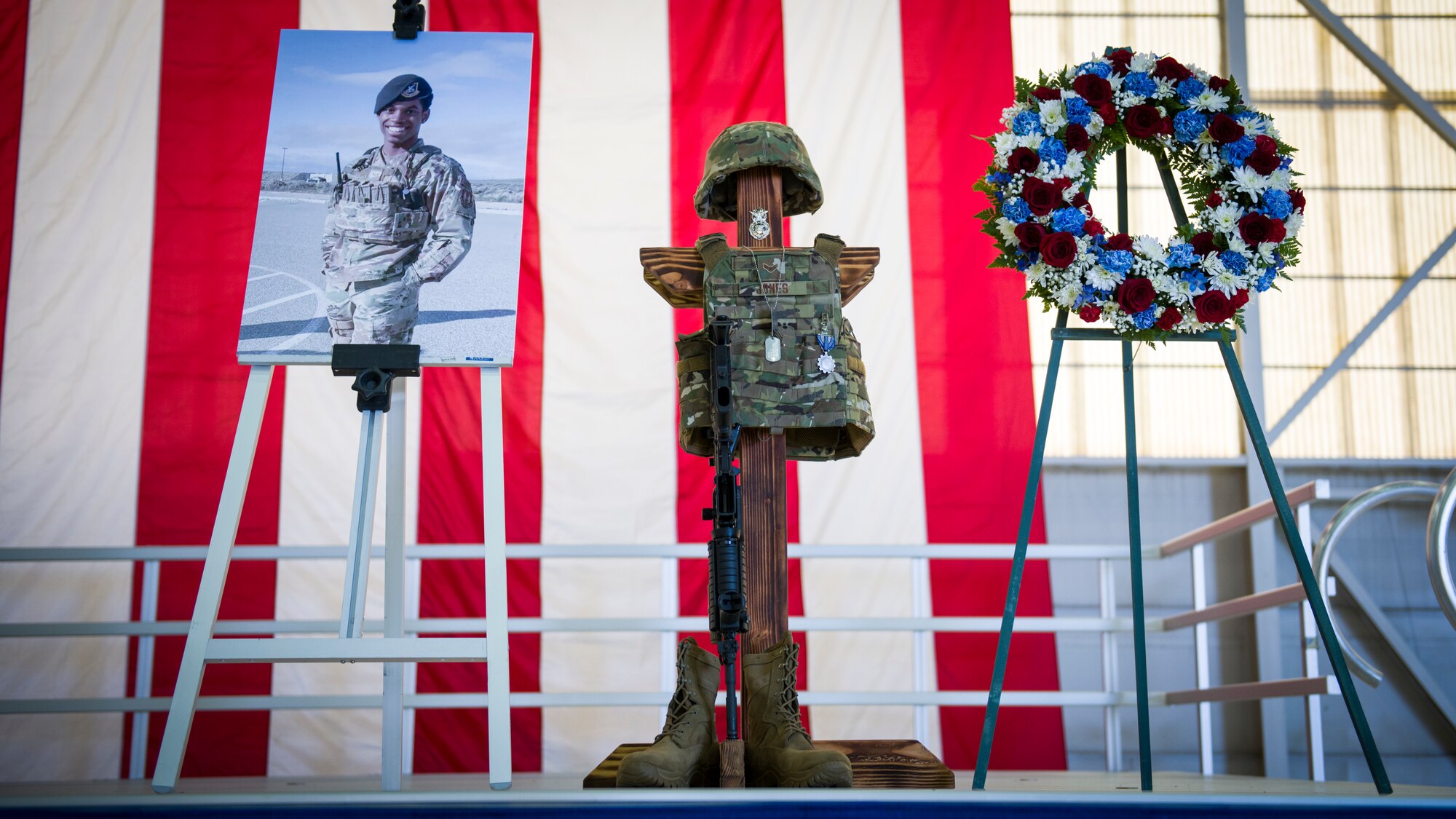 Airman 1st Class Cory Jones Jr., 19 of Ypsilanti, Michigan and Dallas, Texas, was honored during a memorial service on Edwards Air Force Base, California, Aug. 3. Jones was assigned to Alpha Flight and began his five skill level upgrade training and duty position qualification training. Corey was certified as a Response Force Member and Entry Controller and contributed to the Test Wing’s mission for the Air Forces’ second largest installation, which encompasses 308,000 acres, 71 test aircraft, 573 miles of roads and the security of 11,259 base personnel. (Air Force photo by Giancarlo Casem)