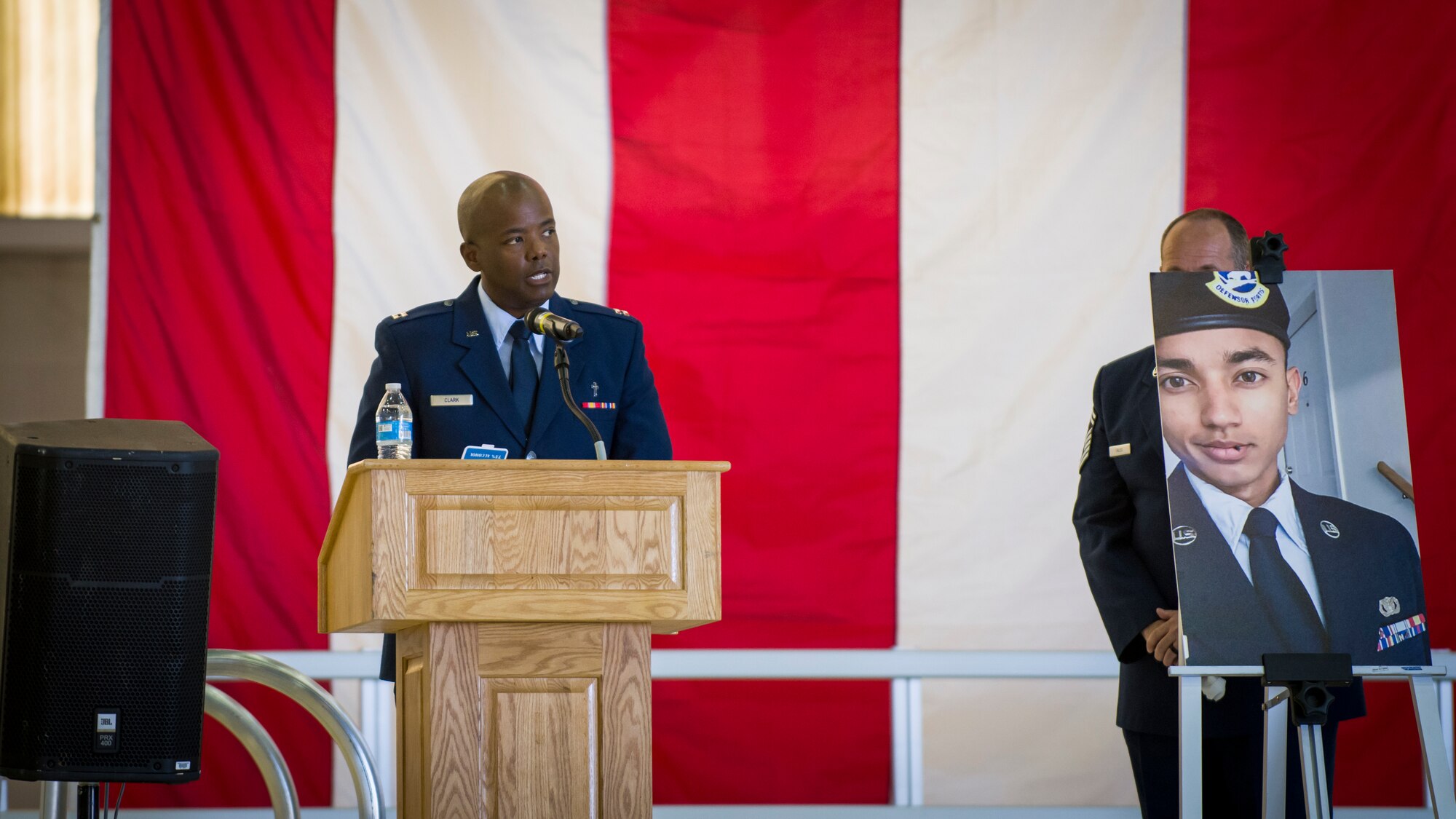 Chaplain, Capt. Jay Clark provides his remarks during a memorial service for three Security Forces members lost this year at Edwards Air Force Base, California, Aug. 3. (Air Force photo by Giancarlo Casem)