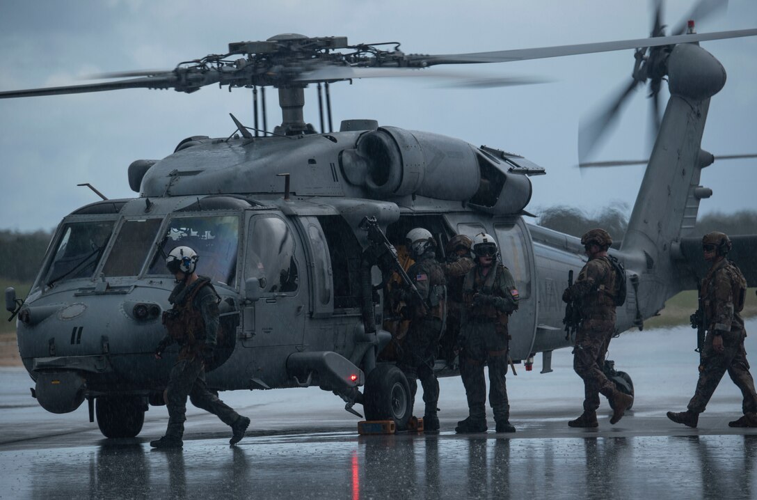 Airmen enter helicopter