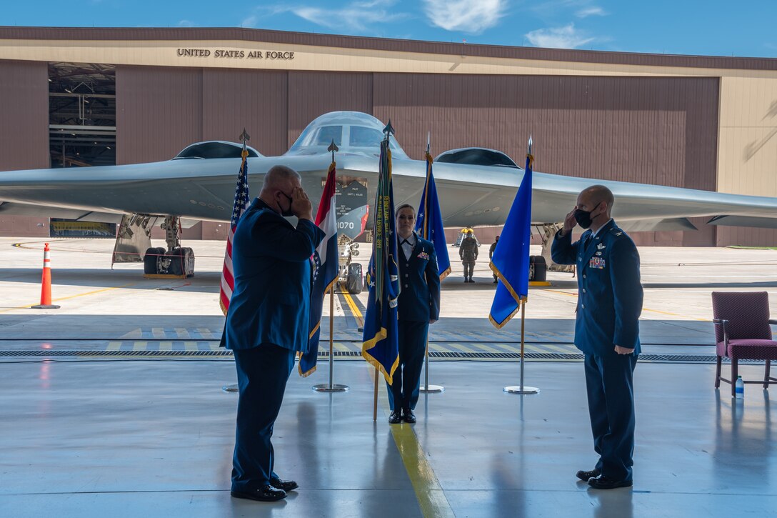 Brig. Gen. Kenneth Eaves, Assistant Adjutant General - Air, Missouri National Guard, exchanges a salute with Col. Matthew D. Calhoun, 131st Bomb Wing commander, during an assumption of command ceremony, Aug. 1, 2020, at Whiteman AFB, Mo. Calhoun, who previously served as the wing’s vice commander, took command of the 131st Bomb Wing, the Air National Guard's only B-2 Spirit stealth bomber wing. (U.S. Air National Guard photo by Airman 1st Class Joseph Geldermann)