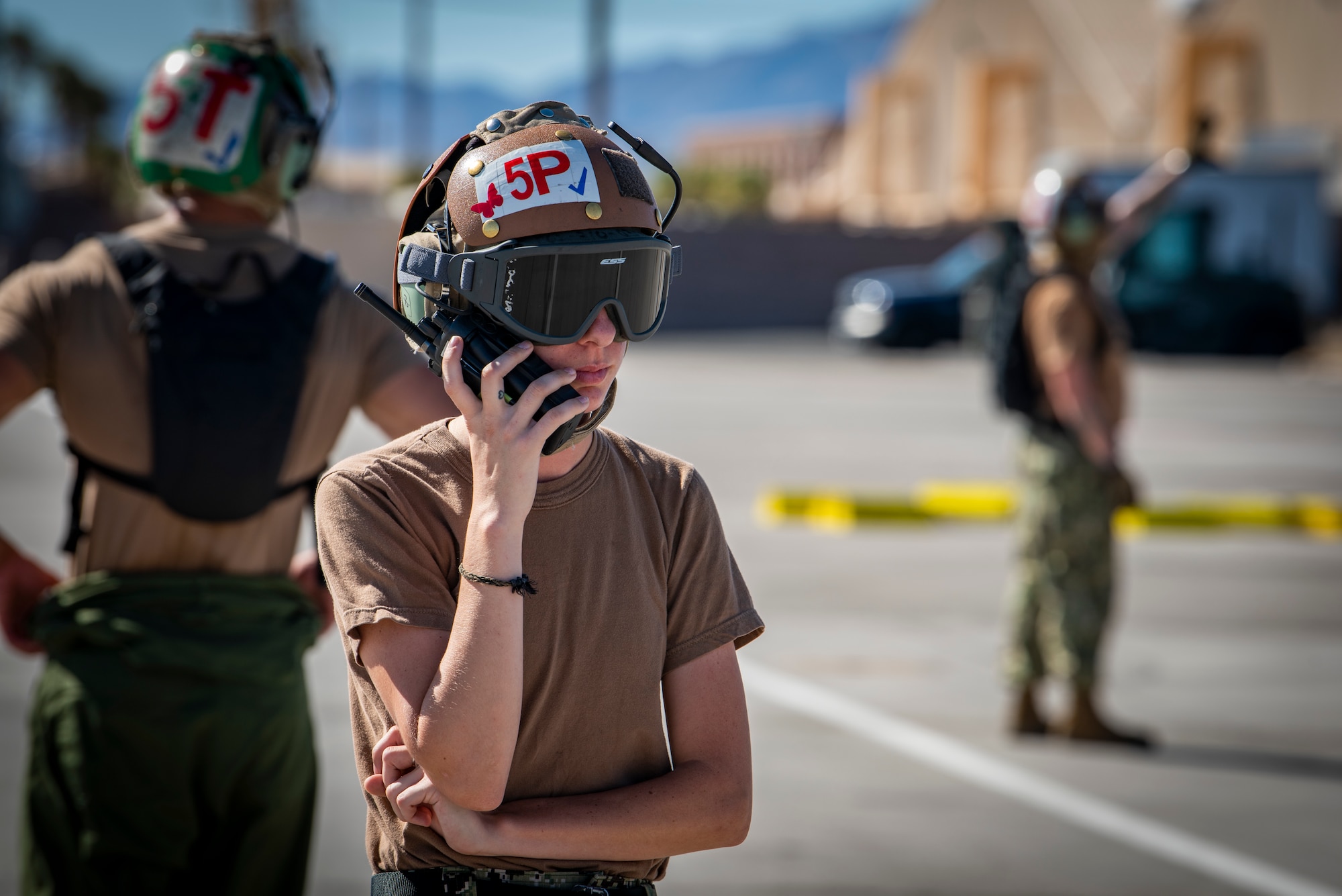 Airman talks on radio.