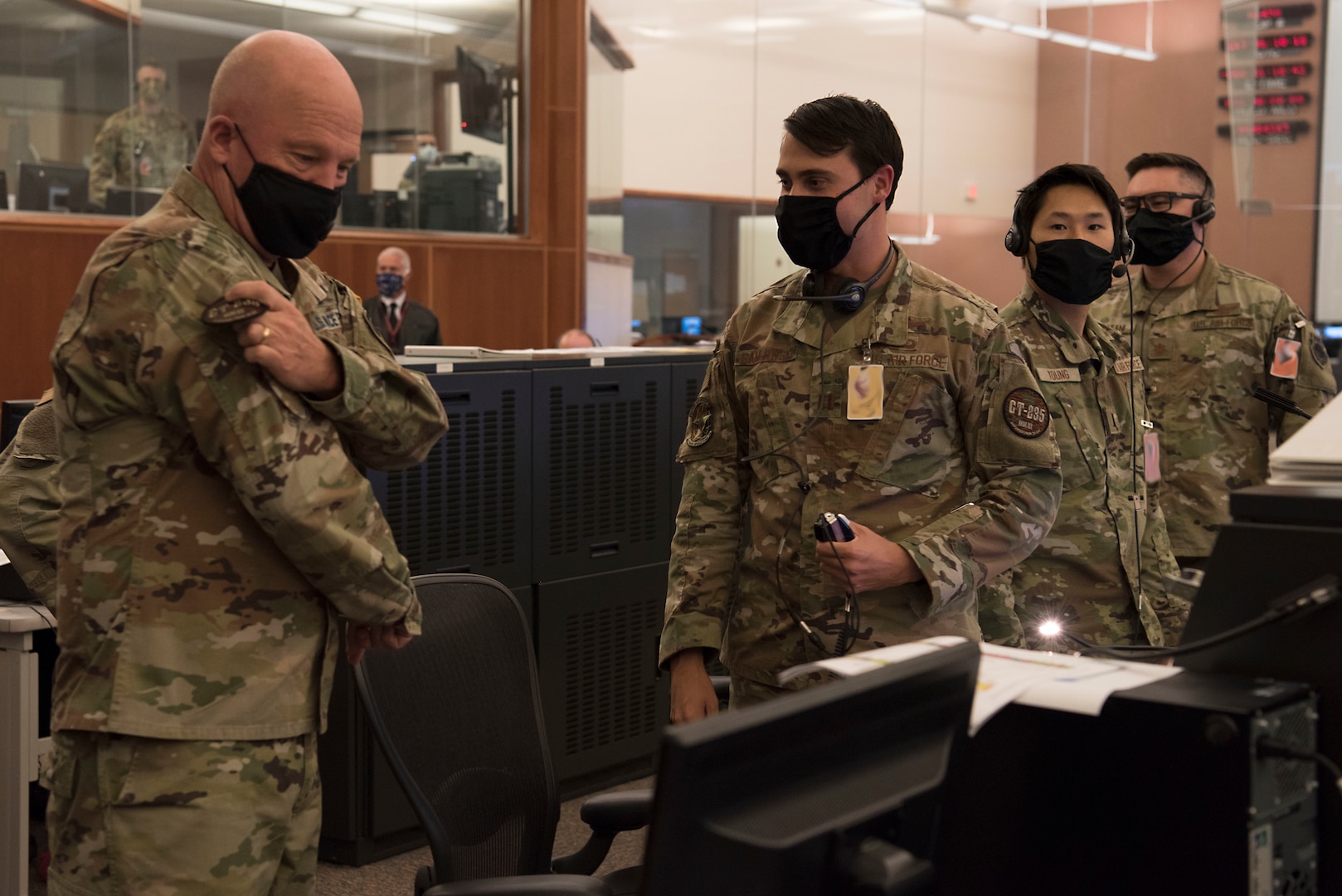 Gen. Jay Raymond, U.S. Space Force Chief of Space Operations and commander of U.S. Space Command, receives a GT-235 mission patch while touring the 30th Space Wing’s Western Range Operation Control Center Aug. 3, 2020 at Vandenberg Air Force Base, Calif.