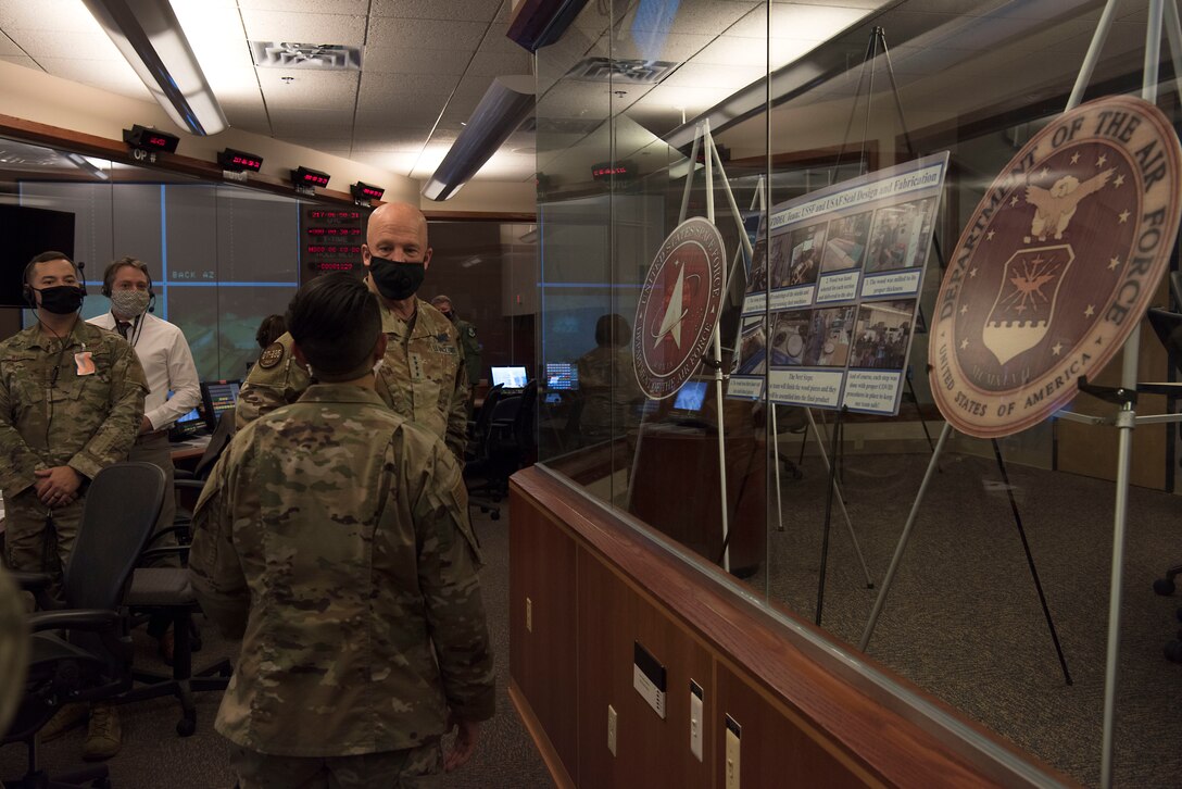 Gen. Jay Raymond, U.S. Space Force Chief of Space Operations and commander of U.S. Space Command, looks at life-sized drafts of the U.S. Space Force seals that will be fabricated by the Training Device Design and Engineering Center for display in the 30th Space Wing’s Western Range Operation Control Center during a visit Aug. 3, 2020 at Vandenberg Air Force Base, Calif.