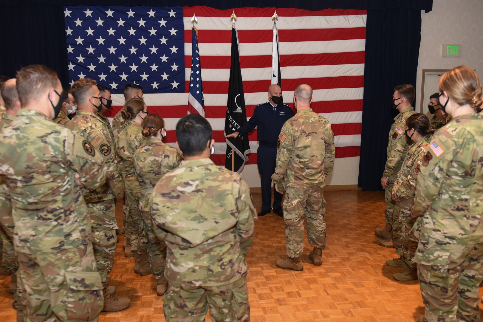 Photo of General Raymond talking with Space Force Lieutenants