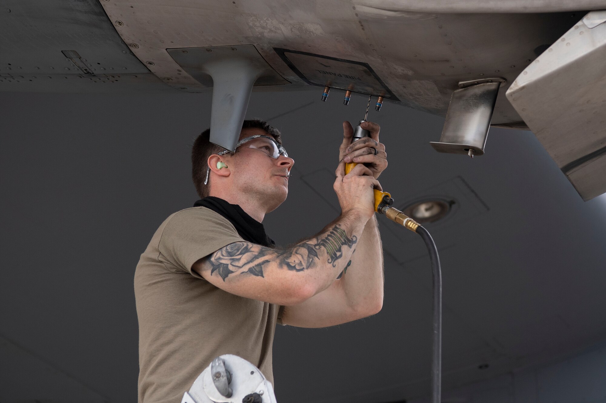 A maintainer from the 19th Aircraft Maintenance Squadron services a C-130J Super Hercules during pre-deployment training at Montrose Regional Airport, Colorado, July 27, 2020. This training is part of the 4/12 deployment initiative, which was developed in 2019 between airlift squadrons from Dyess Air Force Base, Texas and Little Rock AFB, allowing each squadron a full year of dwell time followed by a four-month rotation to their respective area of responsibility. (U.S. Air Force photo by Airman 1st Class Aaron Irvin)