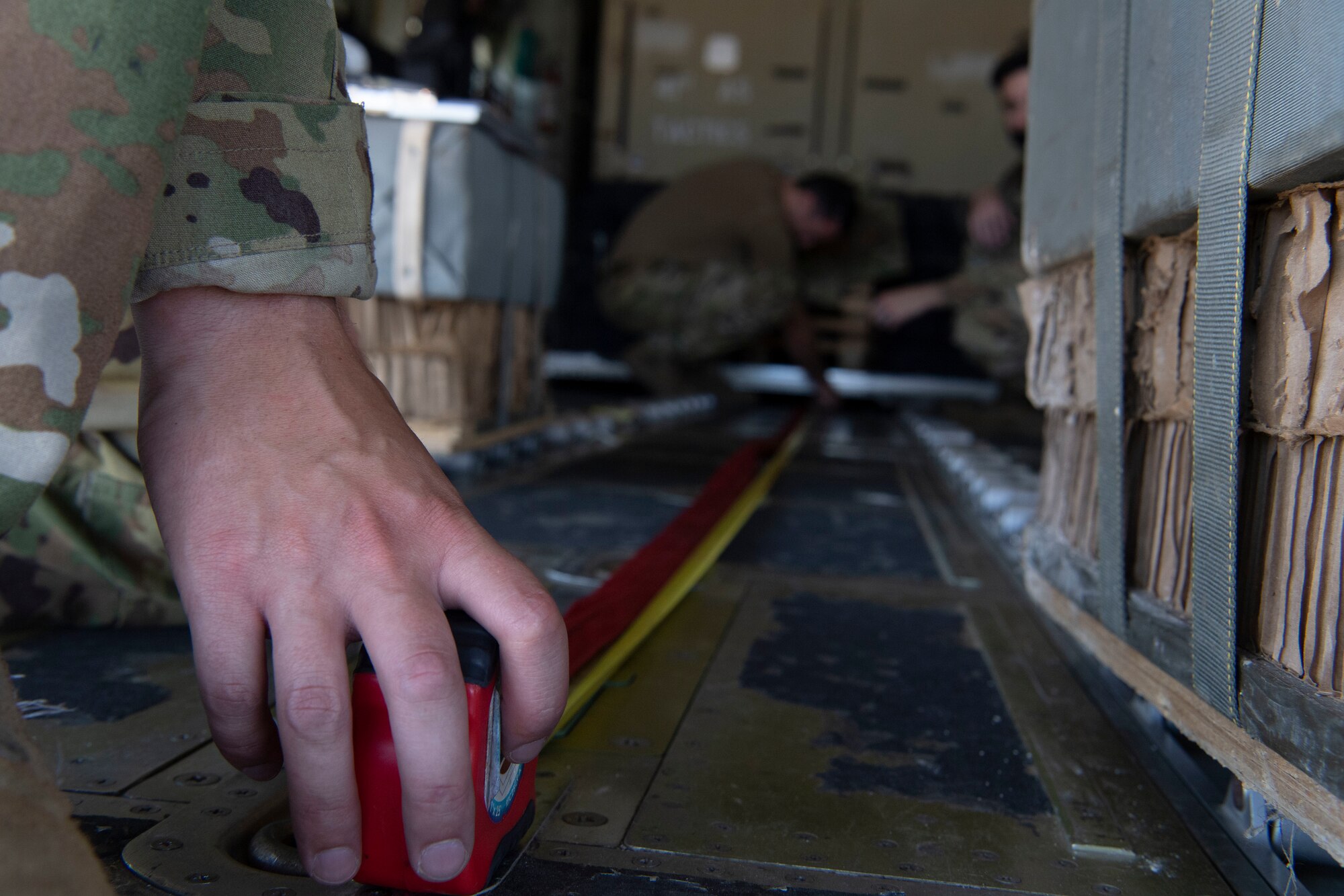 Airman 1st Class Cameron Bou, 41st Airlift Squadron loadmaster, prepares a C-130J Super Hercules for loading operations during pre-deployment training at Montrose Regional Airport, Colorado, July 27, 2020. This training is part of the 4/12 deployment initiative, which was developed in 2019 between airlift squadrons from Dyess Air Force Base, Texas and Little Rock AFB, allowing each squadron a full year of dwell time followed by a four-month rotation to their respective area of responsibility. (U.S. Air Force photo by Airman 1st Class Aaron Irvin)