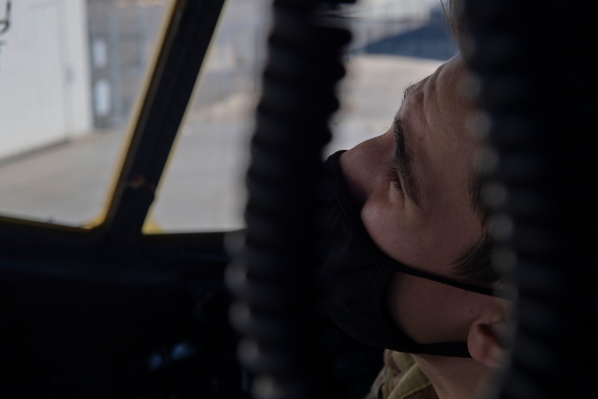 Airman 1st Class Cameron Bou, 41st Airlift Squadron loadmaster, prepares a C-130J Super Hercules for flight during pre-deployment training at Montrose Regional Airport, Colorado, July 27, 2020. This training is part of the 4/12 deployment initiative, which was developed in 2019 between airlift squadrons from Dyess Air Force Base, Texas and Little Rock AFB, allowing each squadron a full year of dwell time followed by a four-month rotation to their respective area of responsibility. (U.S. Air Force photo by Airman 1st Class Aaron Irvin)