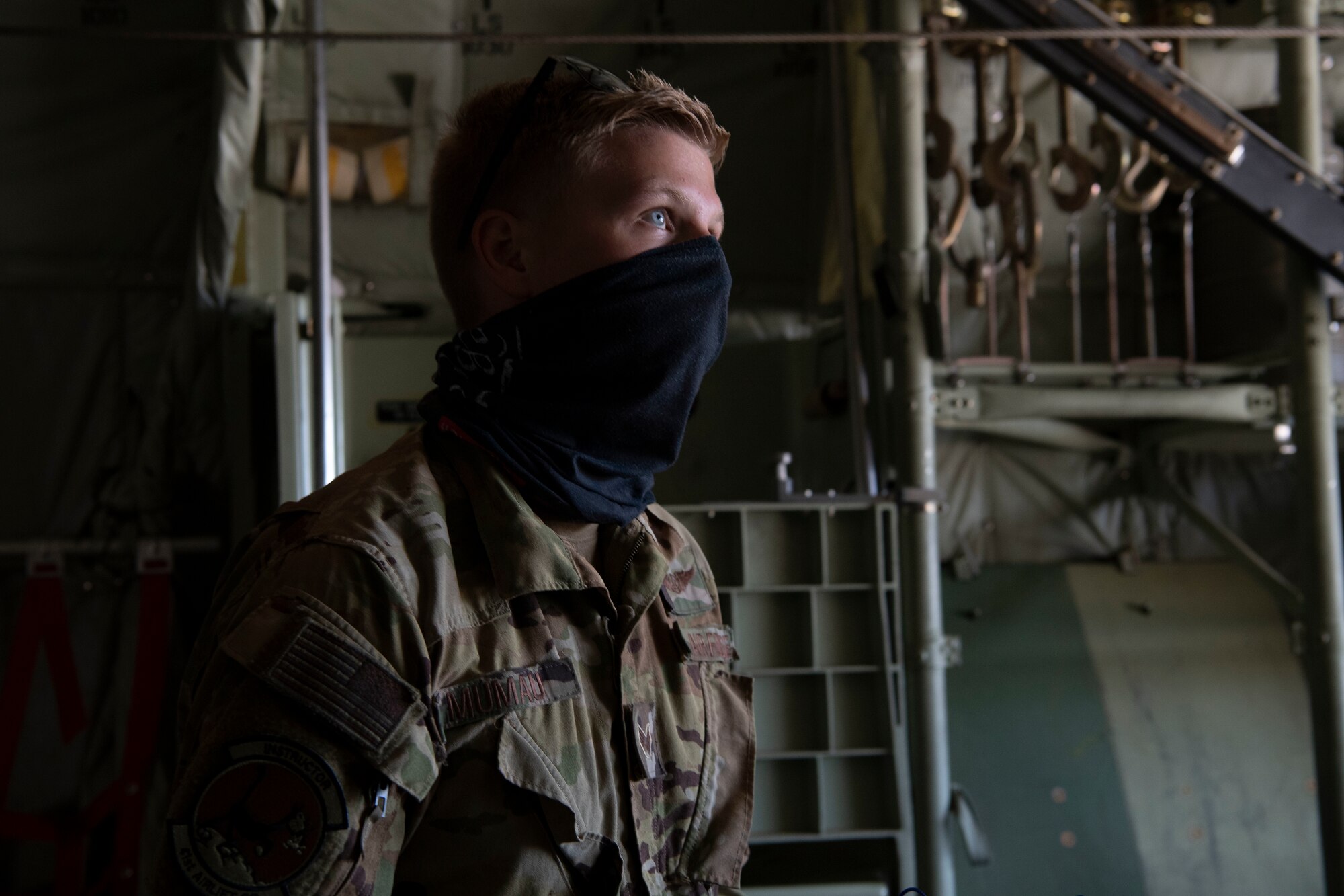 Senior Airman Kirk Mumau, 41st Airlift Squadron loadmaster, prepares a C-130J Super Hercules for flight during pre-deployment training at Montrose Regional Airport, Colorado, July 27, 2020. This training is part of the 4/12 deployment initiative, which was developed in 2019 between airlift squadrons from Dyess Air Force Base, Texas and Little Rock AFB, allowing each squadron a full year of dwell time followed by a four-month rotation to their respective area of responsibility. (U.S. Air Force photo by Airman 1st Class Aaron Irvin)