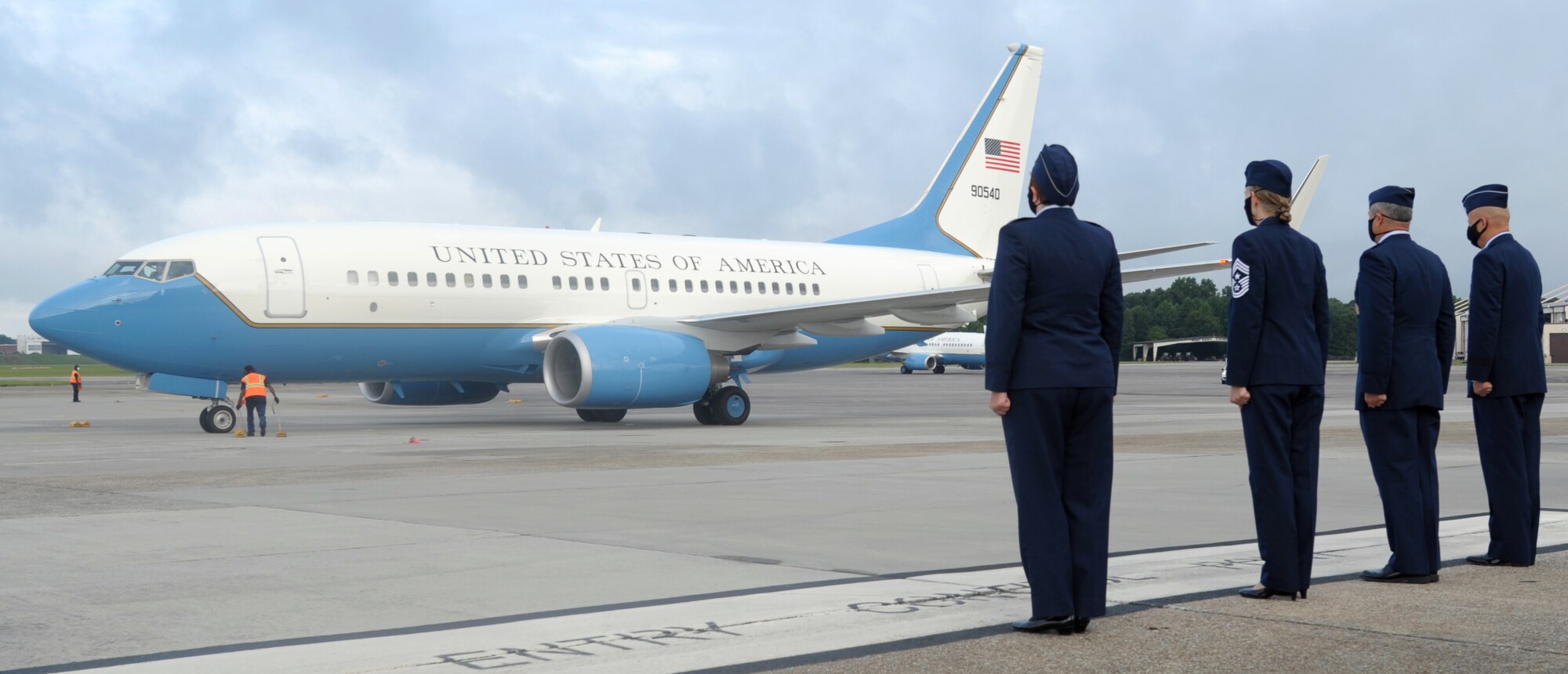 Dobbins Air Reserve Base leadership stand at attention on the flight line July 30, 2020, at Dobbins Air Reserve Base, Georgia. The leadership team greeted members of Congress who arrived for the funeral of Rep. John Lewis. (U.S. Air Force photo by Senior Airman Shelby Thurman)