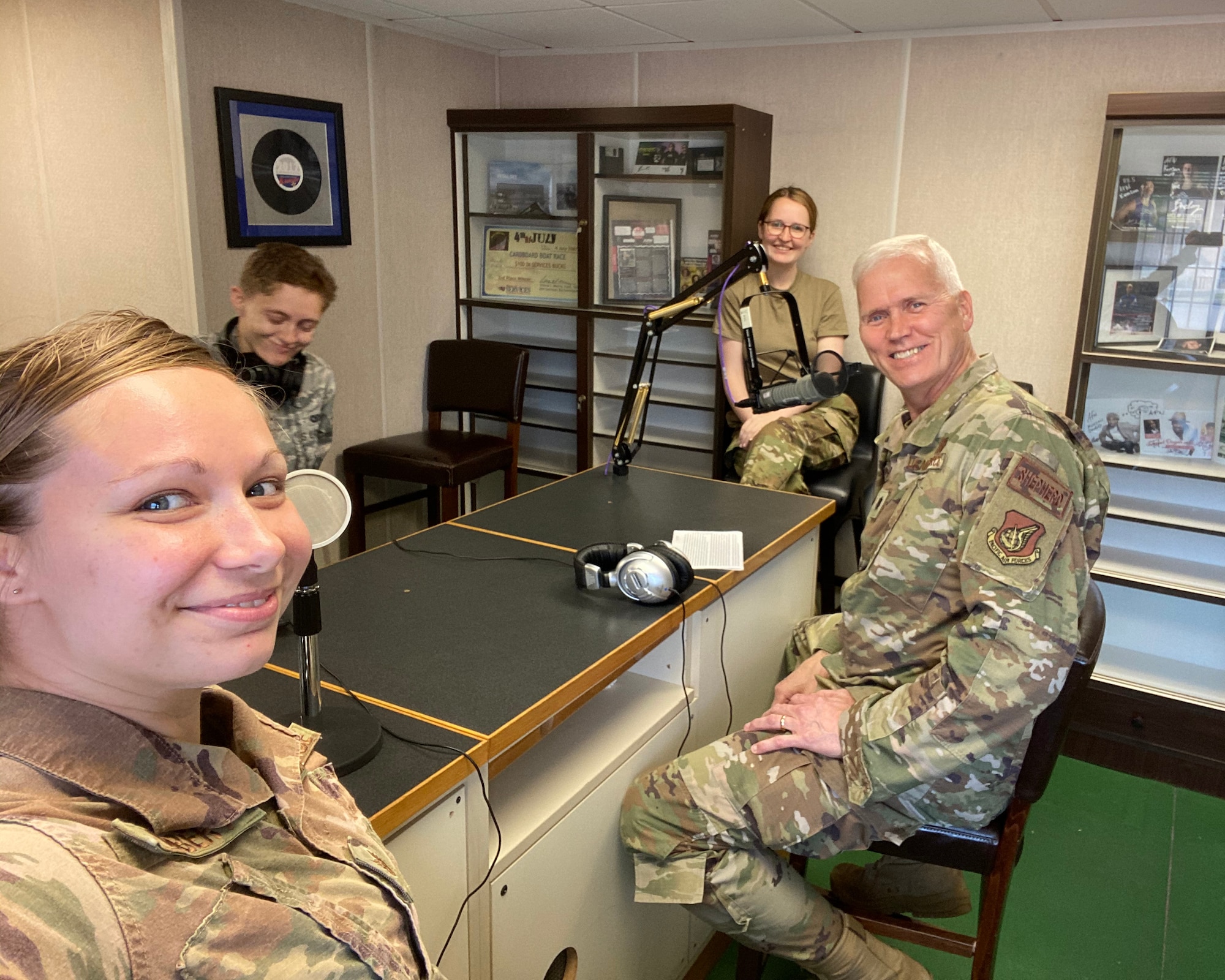 A chaplain assigned to the 8th Fighter Wing, Kunsan Air Base, Republic of Korea, talks with Airmen at the Armed Forces Network, at Kunsan AB. Through True North-Lite, local Enhanced Outreach Mental Health Teams and Religious Support Teams work in partnership to provide intensive support to at-risk units across Pacific Air Forces. (Courtesy Photo)