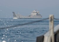 200714-N-FO574-1025 ARABIAN GULF (July 14, 2020) Logistics support vessel Maj. Gen. Charles P. Gross (LSV 5) transits the Arabian Gulf under escort by a Mark VI patrol boat, assigned to Commander, Task Force (CTF) 56, July 14, 2020. CTF 56 is responsible for planning and execution of expeditionary missions, including coastal riverine operations, in the U.S. 5th Fleet area of operations. (U.S. Navy photo by Mass Communication Specialist 3rd Class Jordan R. Bair/Released)