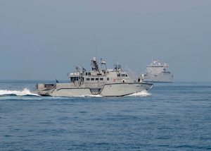 200714-N-FO574-1022 ARABIAN GULF (July 14, 2020) A Mark VI patrol boat (front), assigned to Commander, Task Force (CTF) 56 escorts the logistics support vessel Maj. Gen. Charles P. Gross (LSV 5) in the Arabian Gulf, July 14, 2020. CTF 56 is responsible for planning and execution of expeditionary missions, including coastal riverine operations, in the U.S. 5th Fleet area of operations. (U.S. Navy photo by Mass Communication Specialist 3rd Class Jordan R. Bair/Released)