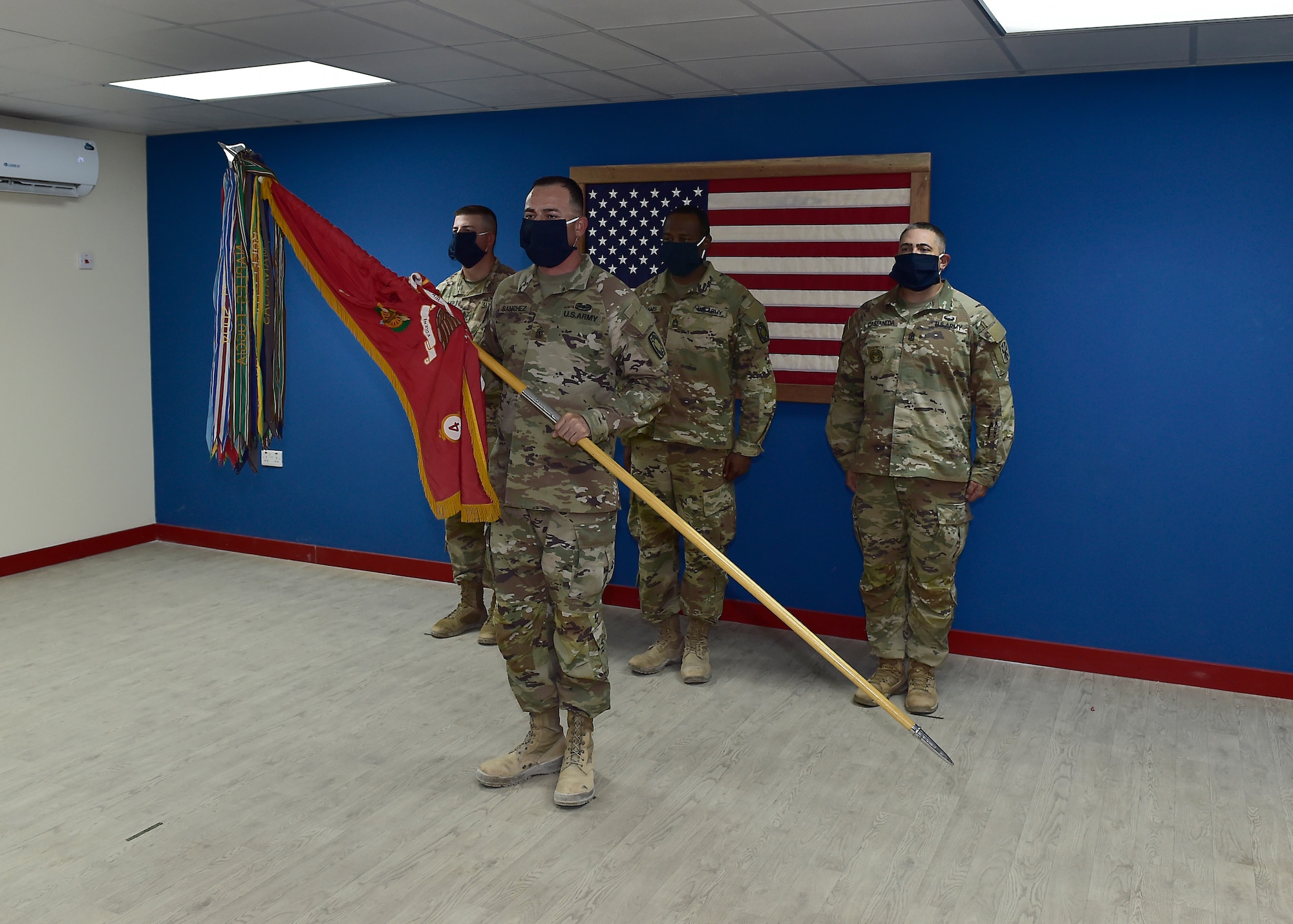 U.S. Army CSM Seagram Porter, outgoing command sergeant major, relinquishes responsibility of the 4-5 Air Defense Artillery Regiment to CSM Tomas Barrios during a Change of Responsibility Ceremony at Prince Sultan Air Base, Kingdom of Saudi Arabia.