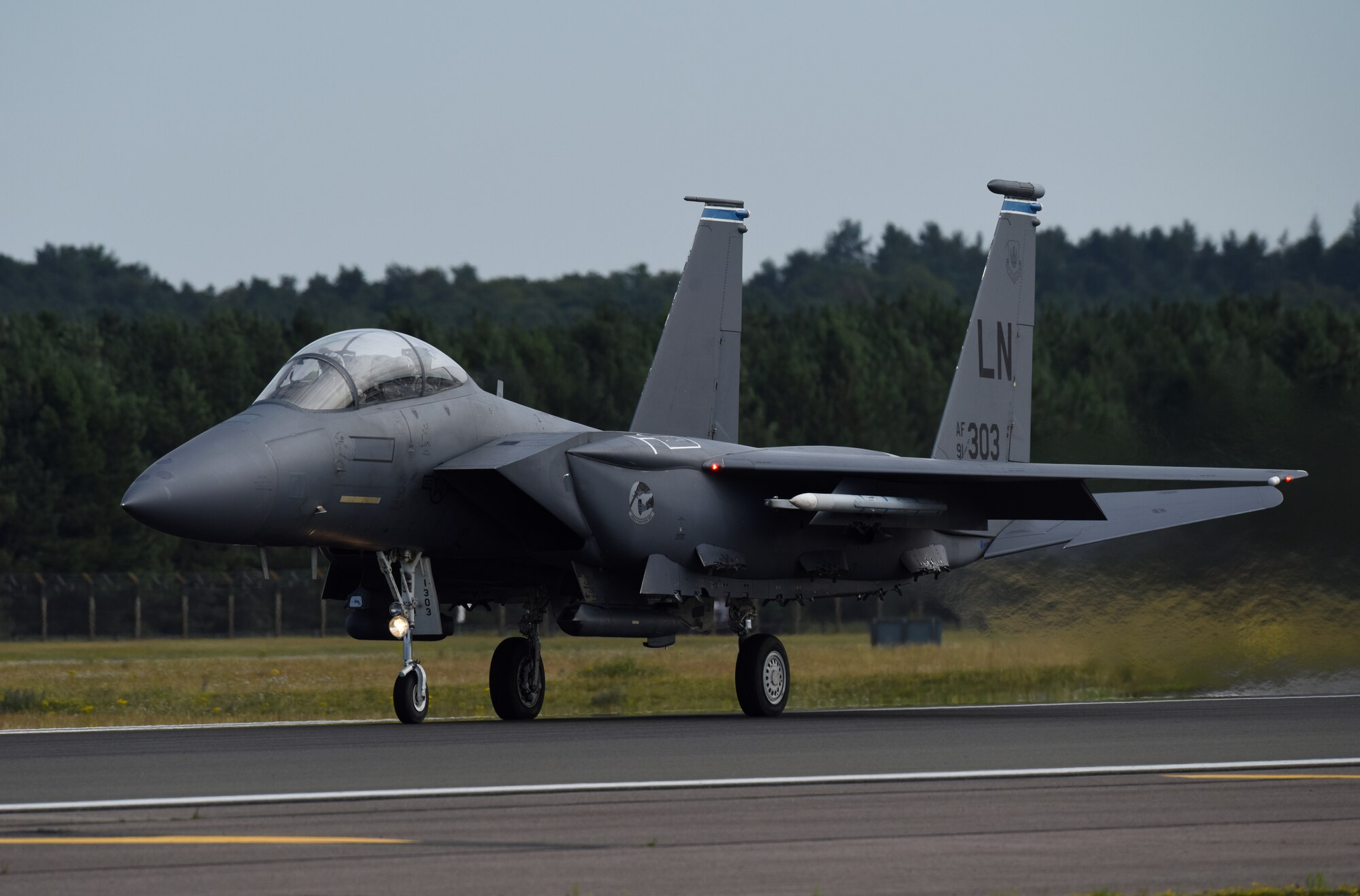 An F-15E Strike Eagle, assigned to the 492nd Fighter Squadron, takes off at Royal Air Force Lakenheath, England, Aug. 4, 2020. The Liberty Wing F-15s provide worldwide responsive combat airpower and support through its highly capable maneuverability and acceleration, weapons systems and avionics. (U.S. Air Force photo by Airman 1st Class Rhonda Smith)