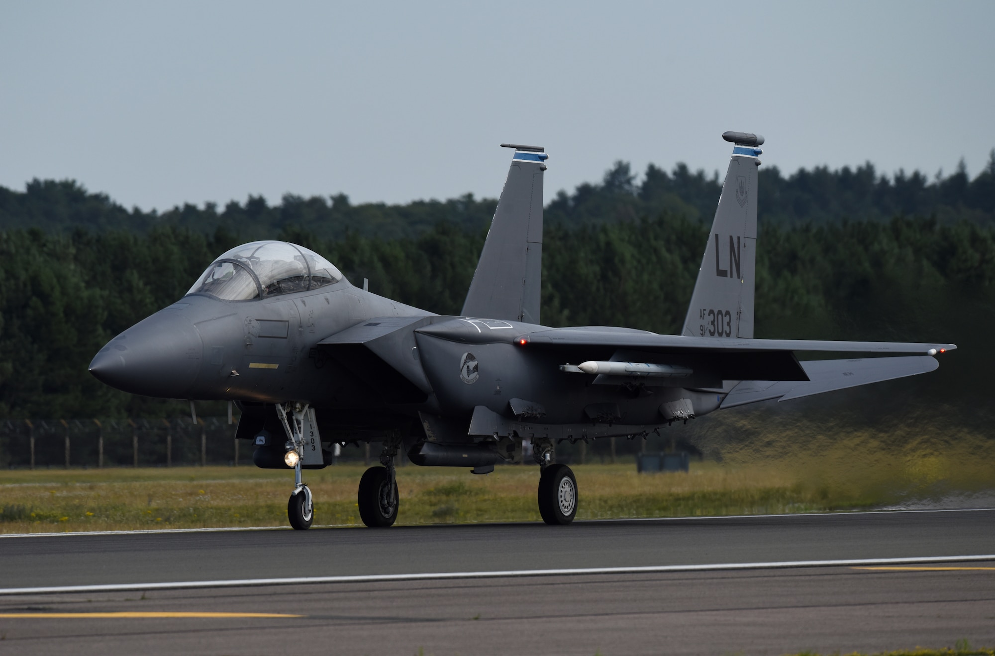 An F-15E Strike Eagle, assigned to the 492nd Fighter Squadron, takes off at Royal Air Force Lakenheath, England, Aug. 4, 2020. The Liberty Wing F-15s provide worldwide responsive combat airpower and support through its highly capable maneuverability and acceleration, weapons systems and avionics. (U.S. Air Force photo by Airman 1st Class Rhonda Smith)