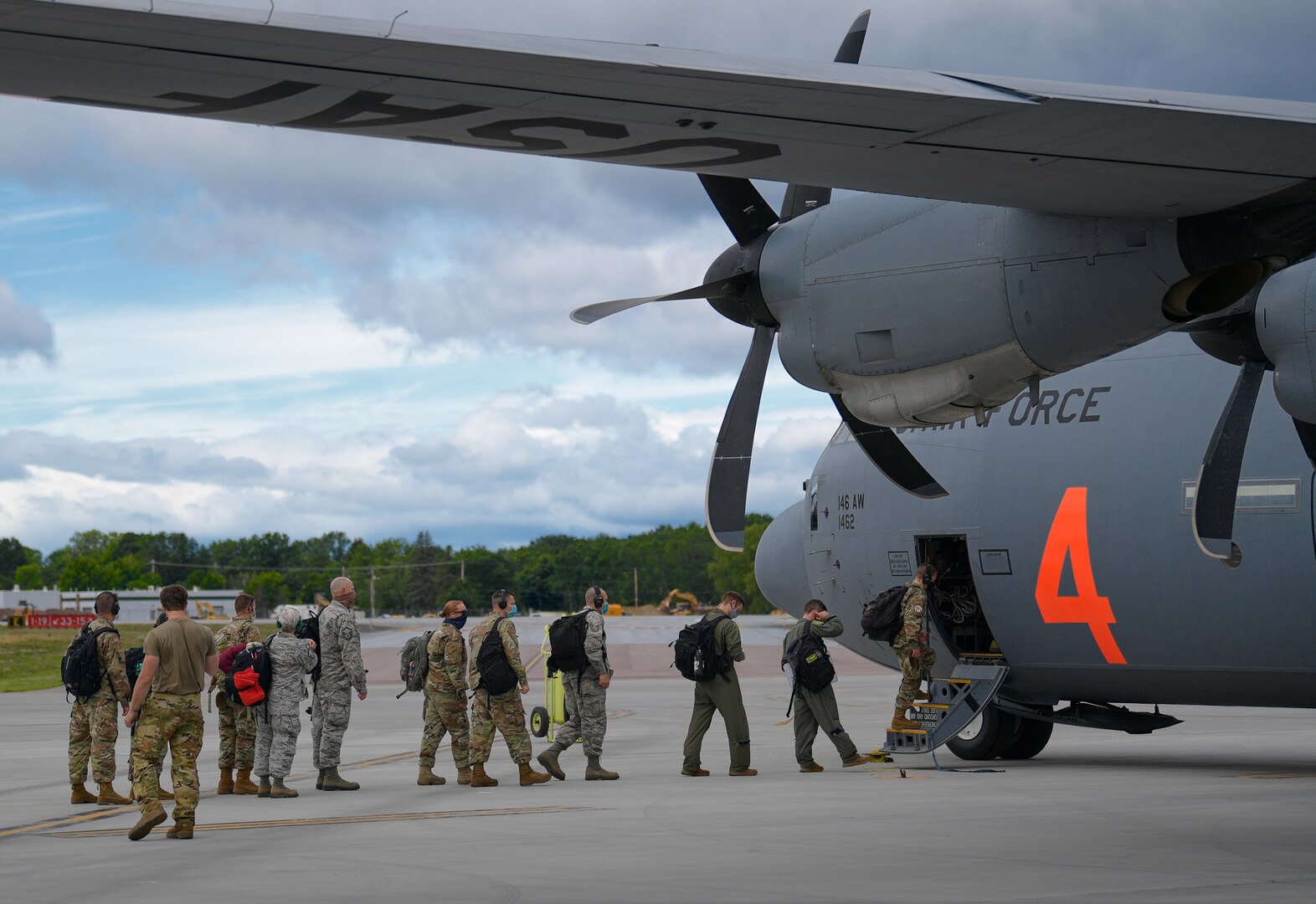 Airmen assigned to the 158th Fighter Wing, Vermont Air National Guard, deploy to Volk Field, Wisconsin, for Operation Northern Lightning, Vermont Air National Guard Base, South Burlington, Vt., Aug. 3, 2020. A C-130 assigned to the 146th Airlift Wing, Channel Islands Air National Guard Station, California Air National Guard, flew the Green Mountain Boys to partake in a two-week exercise where they will train on combat operations involving the F-35A Lightning II.