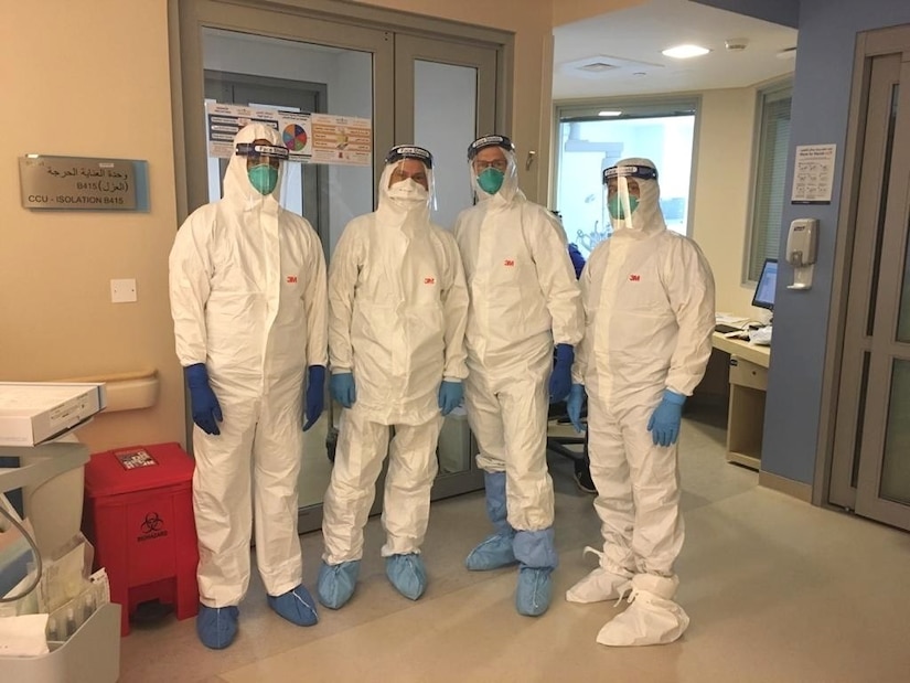 U.S. Air Force Dr. (Col) Terry Lonergan, (2nd from right) and SSMC colleagues wearing personnel protective equipment to check on COVID-19 patients at SSMC.