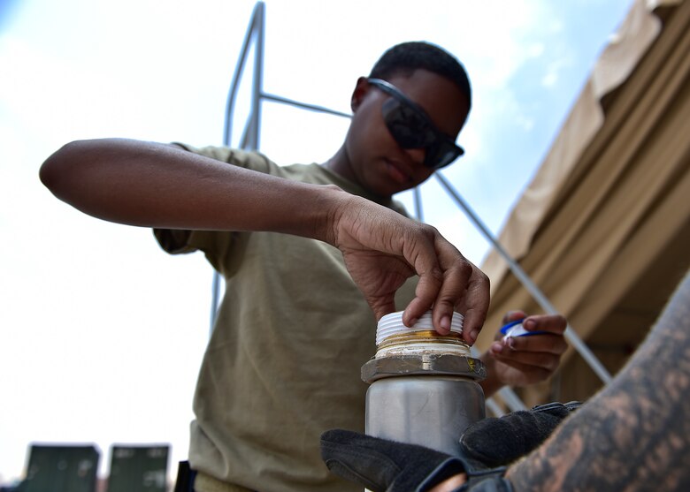 Airmen from the 378th Expeditionary Logisitcs Readiness Squadron perform a hydrostatic test on fuel hoses at Prince Sultan Air Base, Kingdom of Saudi Arabia.