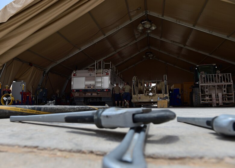 Airmen from the 378th Expeditionary Logisitcs Readiness Squadron perform a hydrostatic test on fuel hoses at Prince Sultan Air Base, Kingdom of Saudi Arabia.