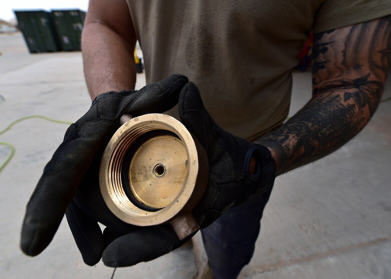 Airmen from the 378th Expeditionary Logisitcs Readiness Squadron perform a hydrostatic test on fuel hoses at Prince Sultan Air Base, Kingdom of Saudi Arabia.