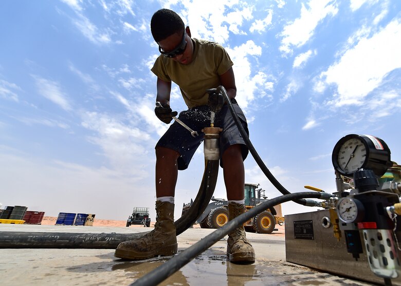 Airmen from the 378th Expeditionary Logisitcs Readiness Squadron perform a hydrostatic test on fuel hoses at Prince Sultan Air Base, Kingdom of Saudi Arabia.