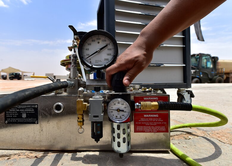 Airmen from the 378th Expeditionary Logisitcs Readiness Squadron perform a hydrostatic test on fuel hoses at Prince Sultan Air Base, Kingdom of Saudi Arabia.