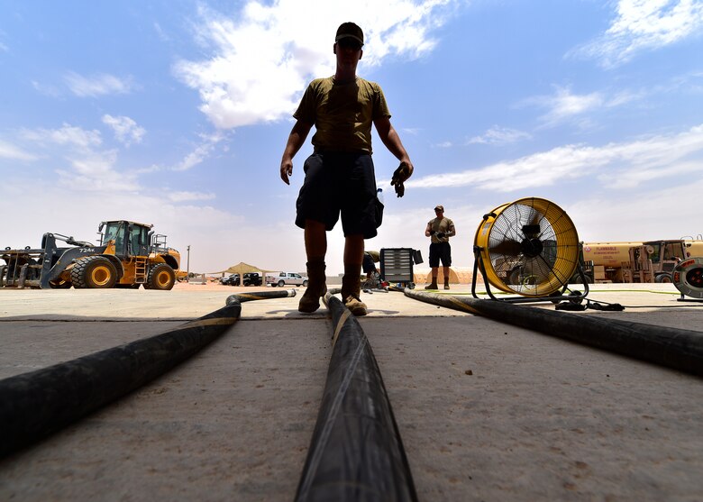 Airmen from the 378th Expeditionary Logisitcs Readiness Squadron perform a hydrostatic test on fuel hoses at Prince Sultan Air Base, Kingdom of Saudi Arabia.