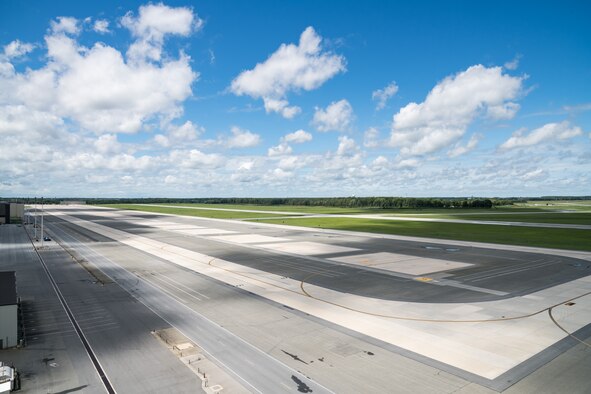 A view from the air traffic control tower of the empty flight line after Tropical Storm Isaias passed over the base, Aug. 4, 2020, at Dover Air Force Base, Delaware. C-5M Super Galaxies and C-17A Globemaster IIIs were flown to other locations prior to the arrival of the storm. The base received 1.4 inches of rain and recorded wind gusts up to 60 miles per hour during the peak of the storm. At least one tornado was reported within five miles of the base. (U.S. Air Force photo by Roland Balik)