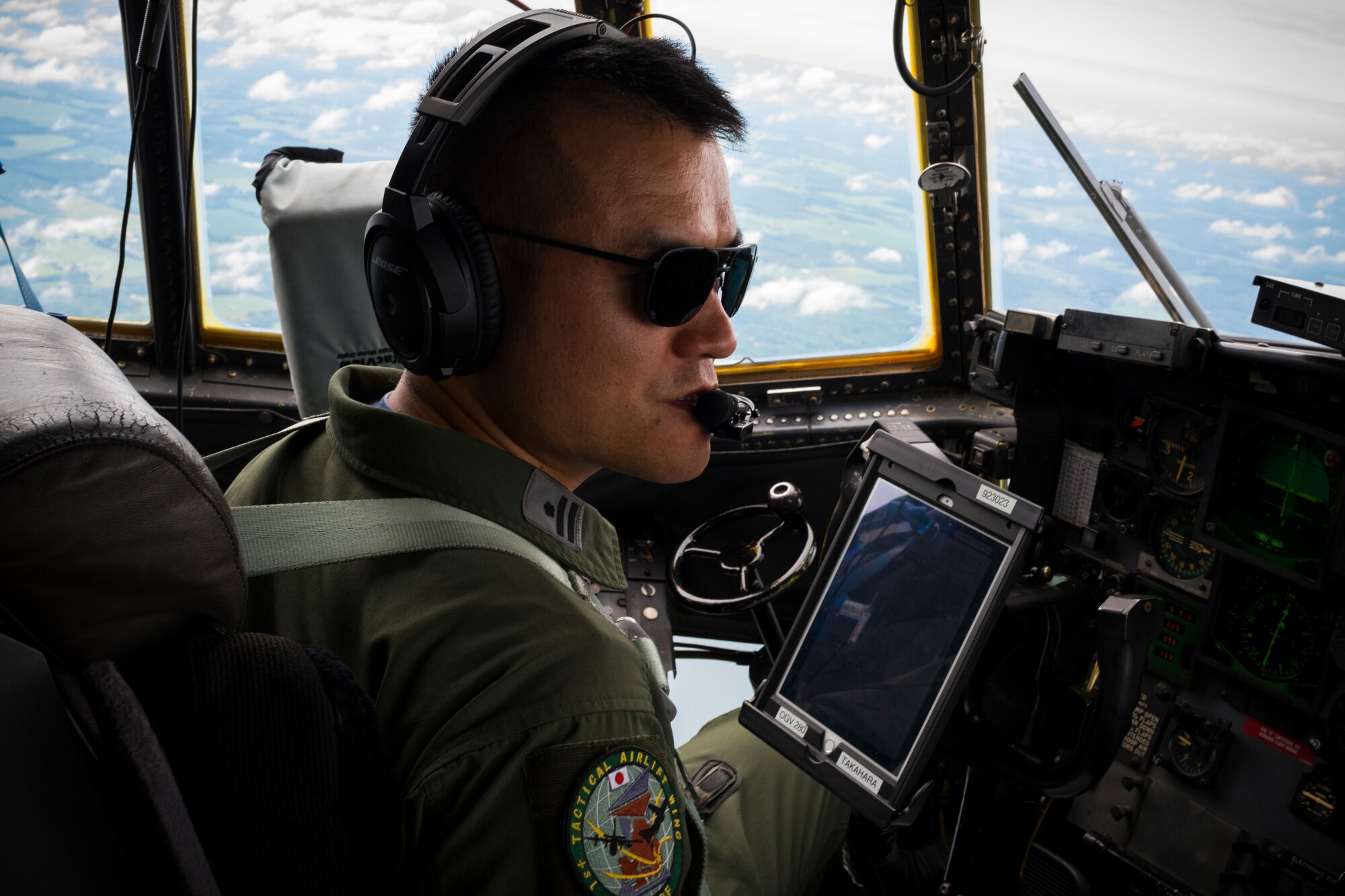 Maj. Kazunori Takahara, a pilot with the Japan Air-Self Defense Force’s 1st Tactical Airlift Wing, flight commands a 757th Airlift Squadron C-130H Hercules aircraft, July 22, 2020, over Northeast Ohio. Takahara is a participant in the Defense Personnel Exchange Program, where he will spend two and a half years assigned to the United States Air Force’s 910th Airlift Wing. The DPEP is designed to nurture the bonds of friendship and understanding that exist between the two air forces through the exchange of ideas and tactics by the members of each service.
