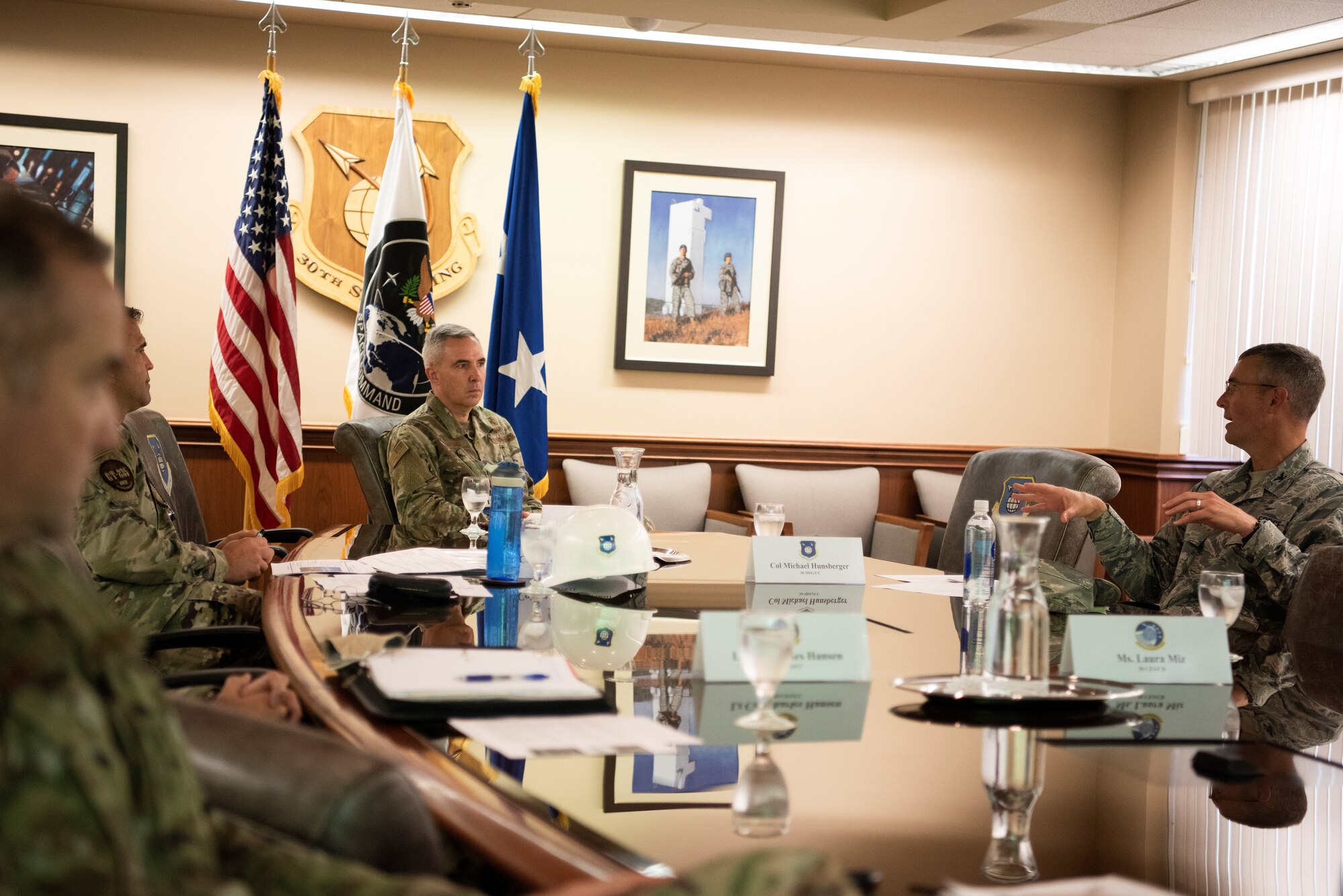 Maj. Gen. Stephen Whiting, U.S. Space Force deputy commander, discusses 30th Space Wing range of the future initiatives with leadership July 29, 2020, at Vandenberg Air Force Base, Calif.  During the visit, Whiting visited various units and learned about new developments for the 30th Space Wing, Combined Force Space Component Command, and 381st Training Group at Vandenberg AFB. (U.S. Force photo by Senior Airman Hanah Abercrombie)